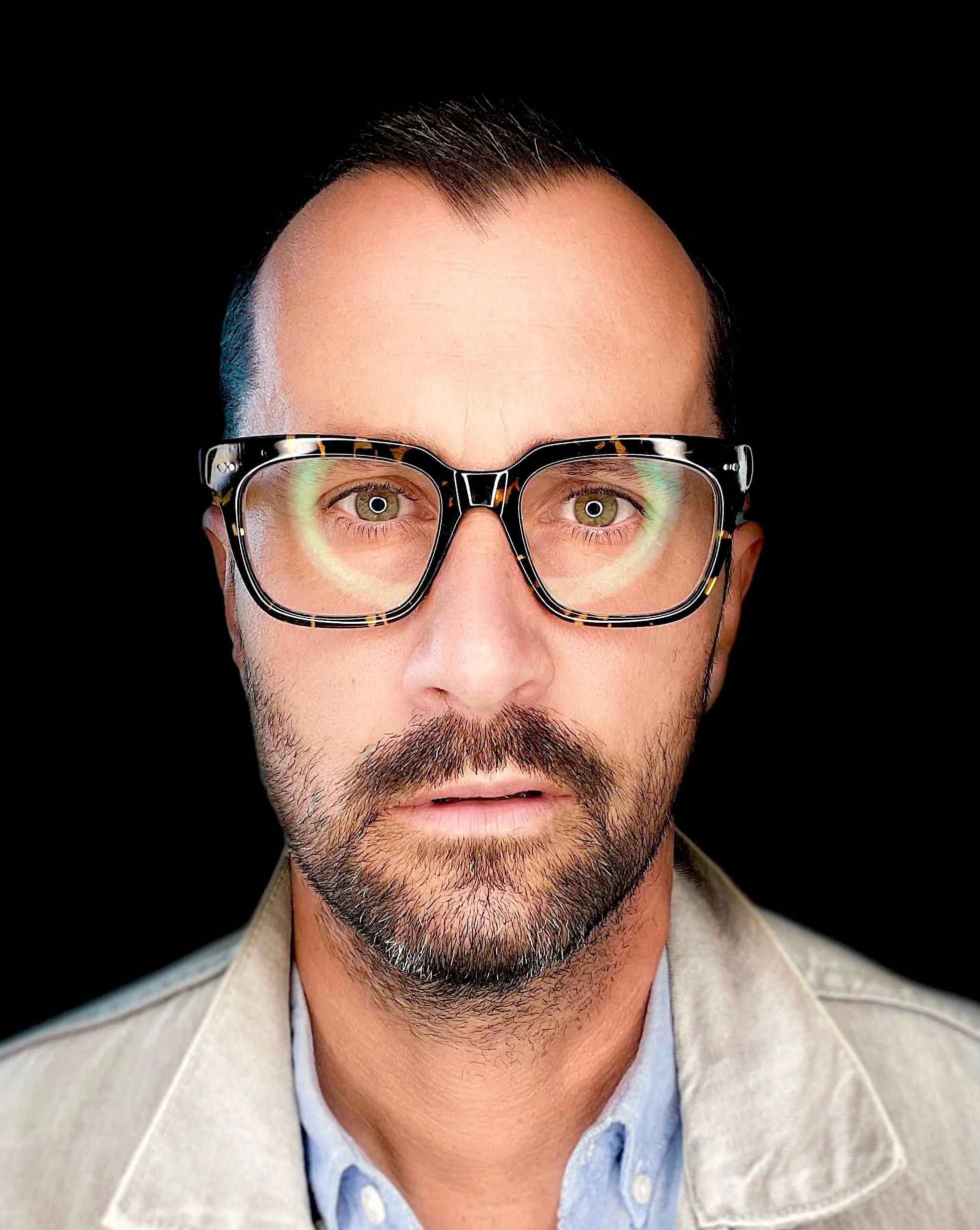 Portrait of Mark Saint, podcaster, malcontent, and movement coach helping others elude the digitized tentacles of the Borg.