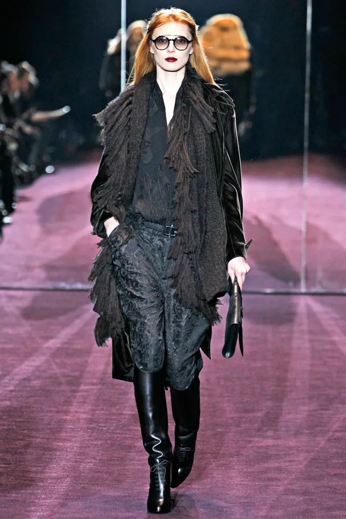 Gucci Fall Winter 2012 runway close-up of floral jacquard trousers in burgundy wool — as seen at Milan Fashion Week