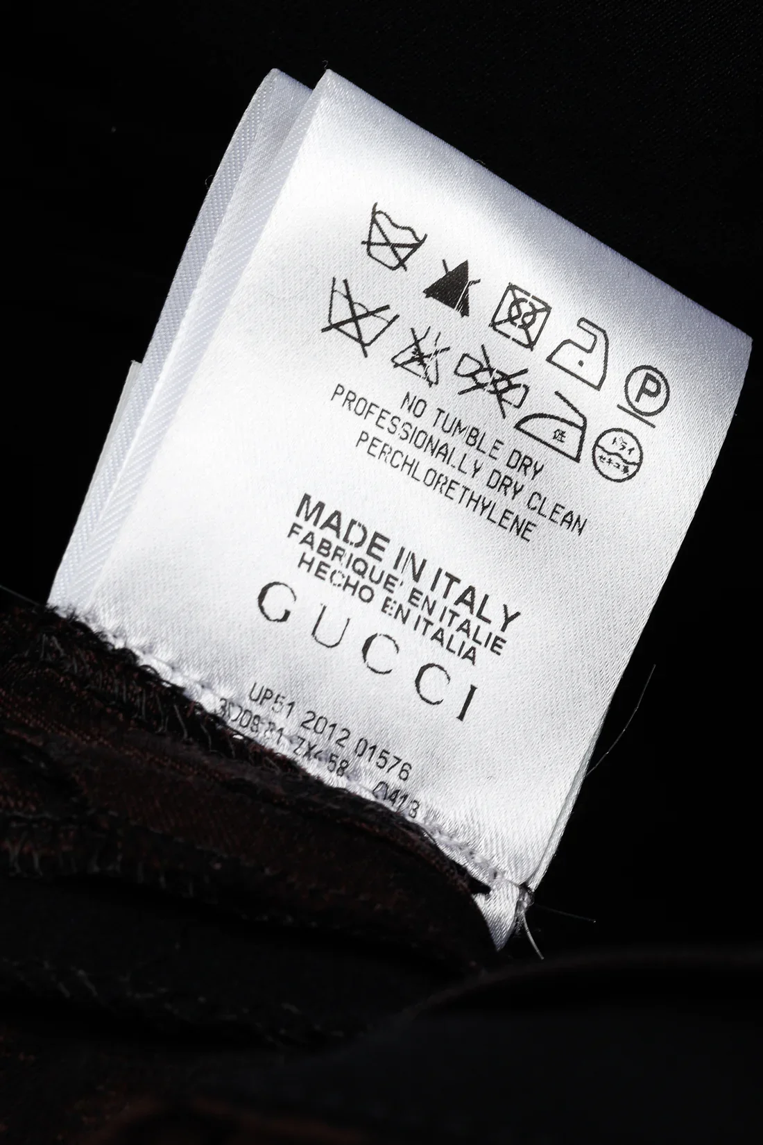 Gucci original care label and size tag — IT 38, 55% wool 45% acetate, made in Italy, pre-owned excellent condition