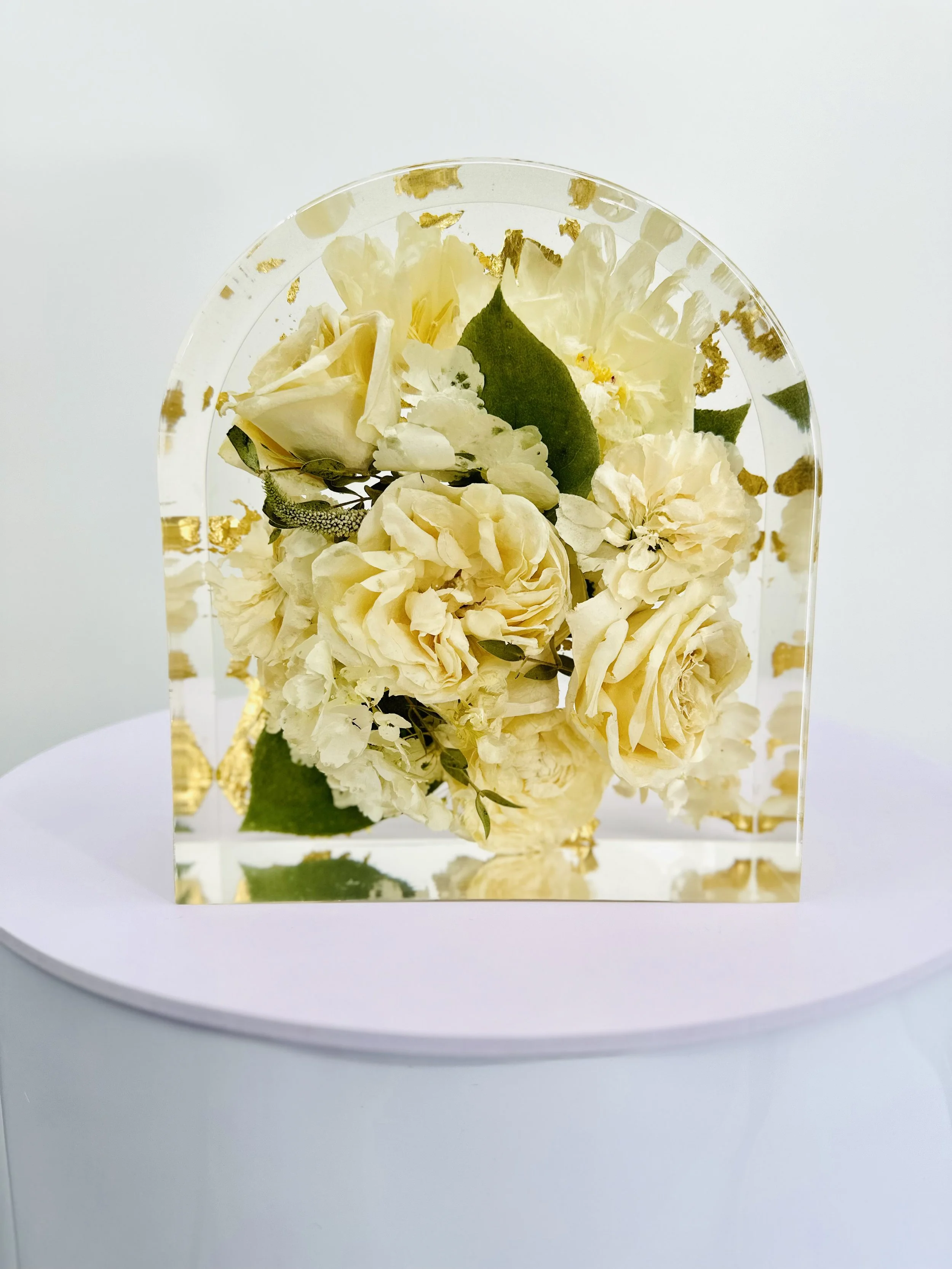 Wedding bouquet preserved in custom floral resin arch – Omaha floral preservation artist