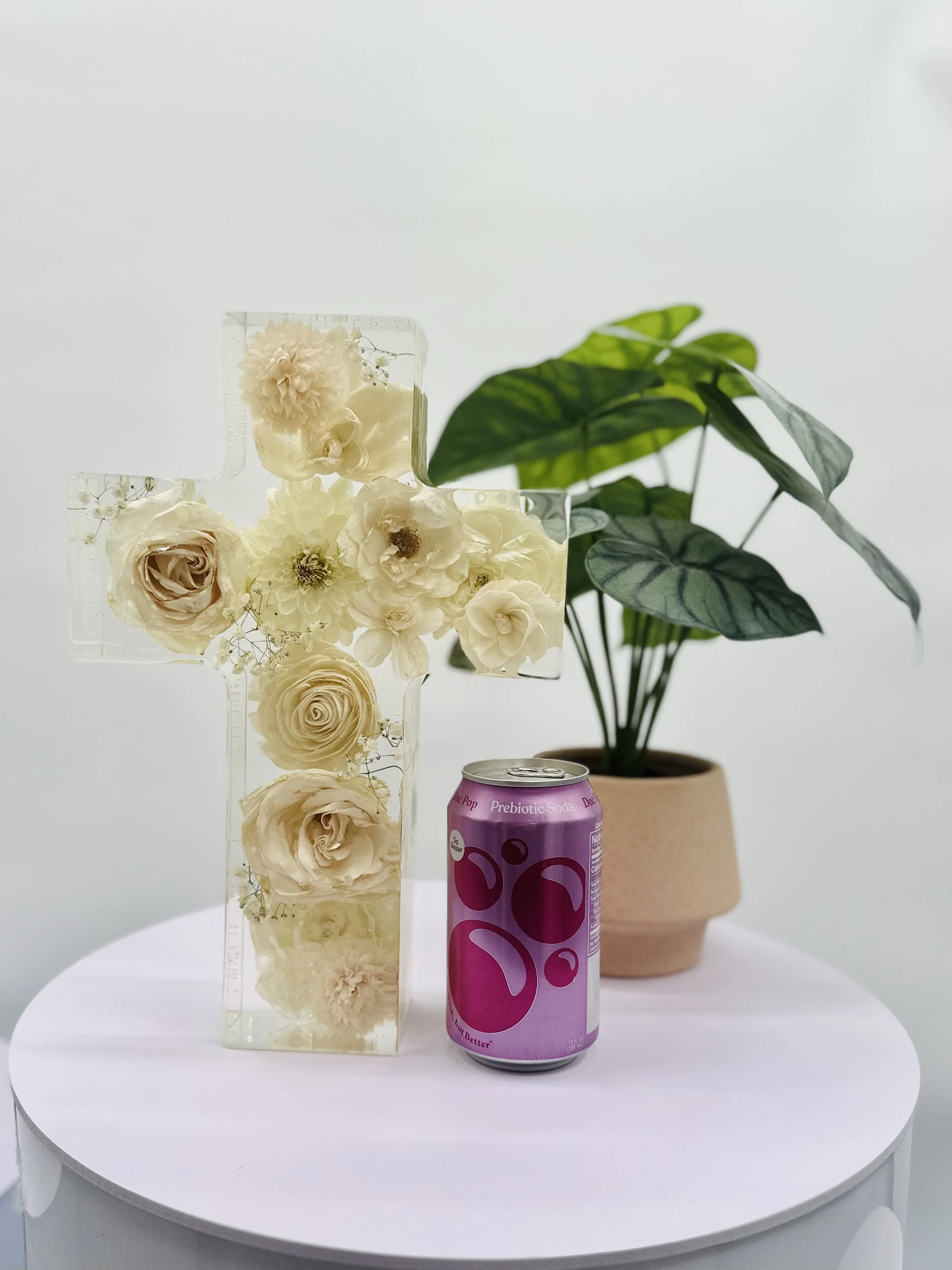 Wedding bouquet preserved in custom floral resin cross – Omaha floral preservation artist