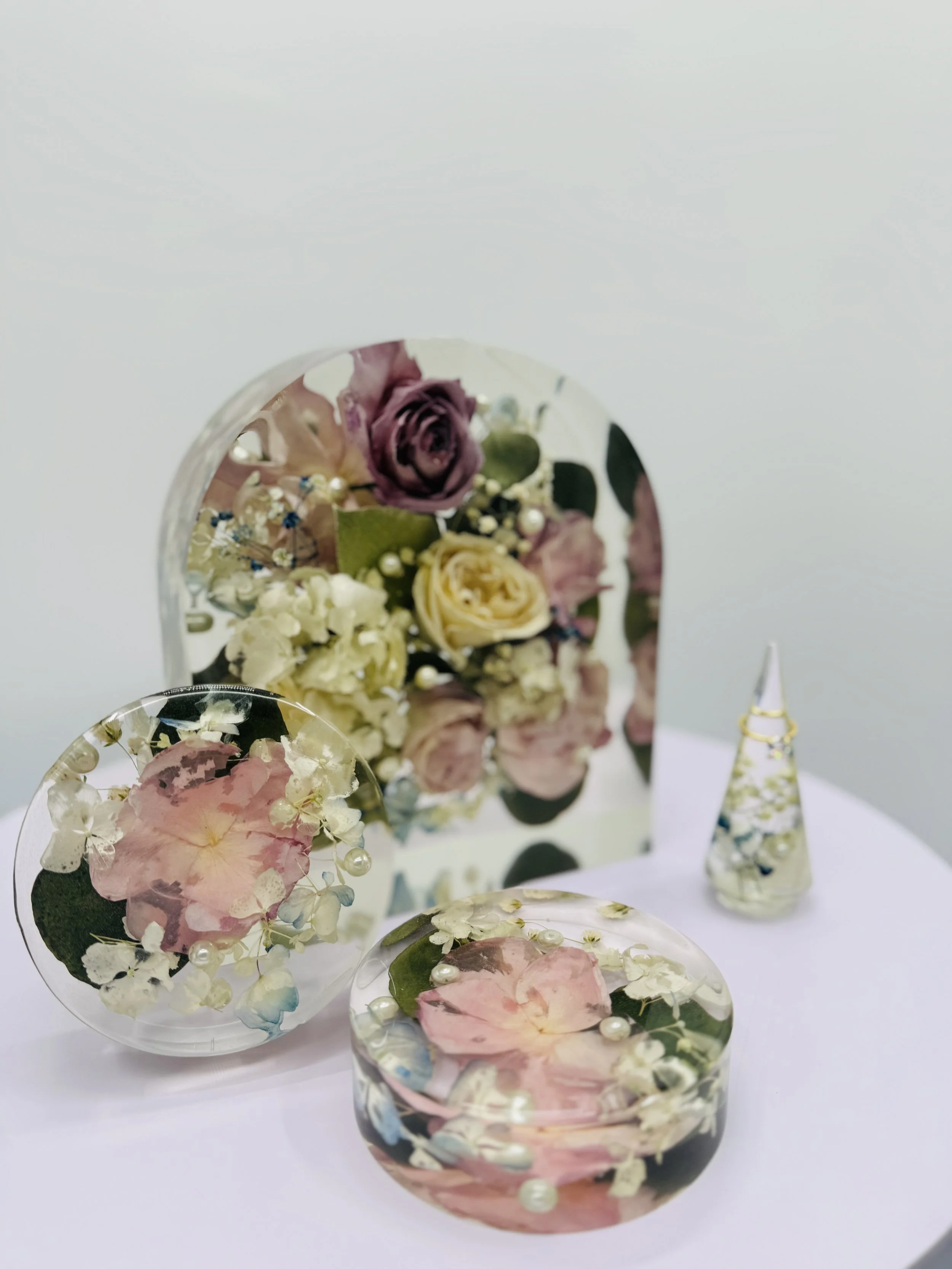 Wedding bouquet preserved in custom floral resin arch – Omaha floral preservation artist