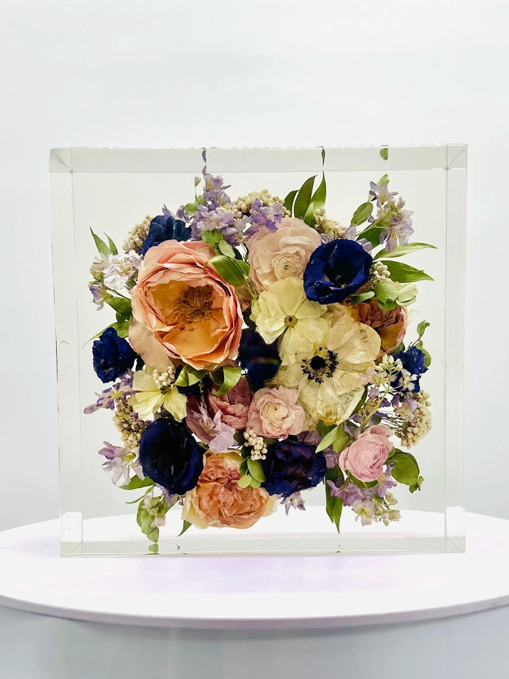 Wedding bouquet preserved in custom floral resin block – Omaha floral preservation artist