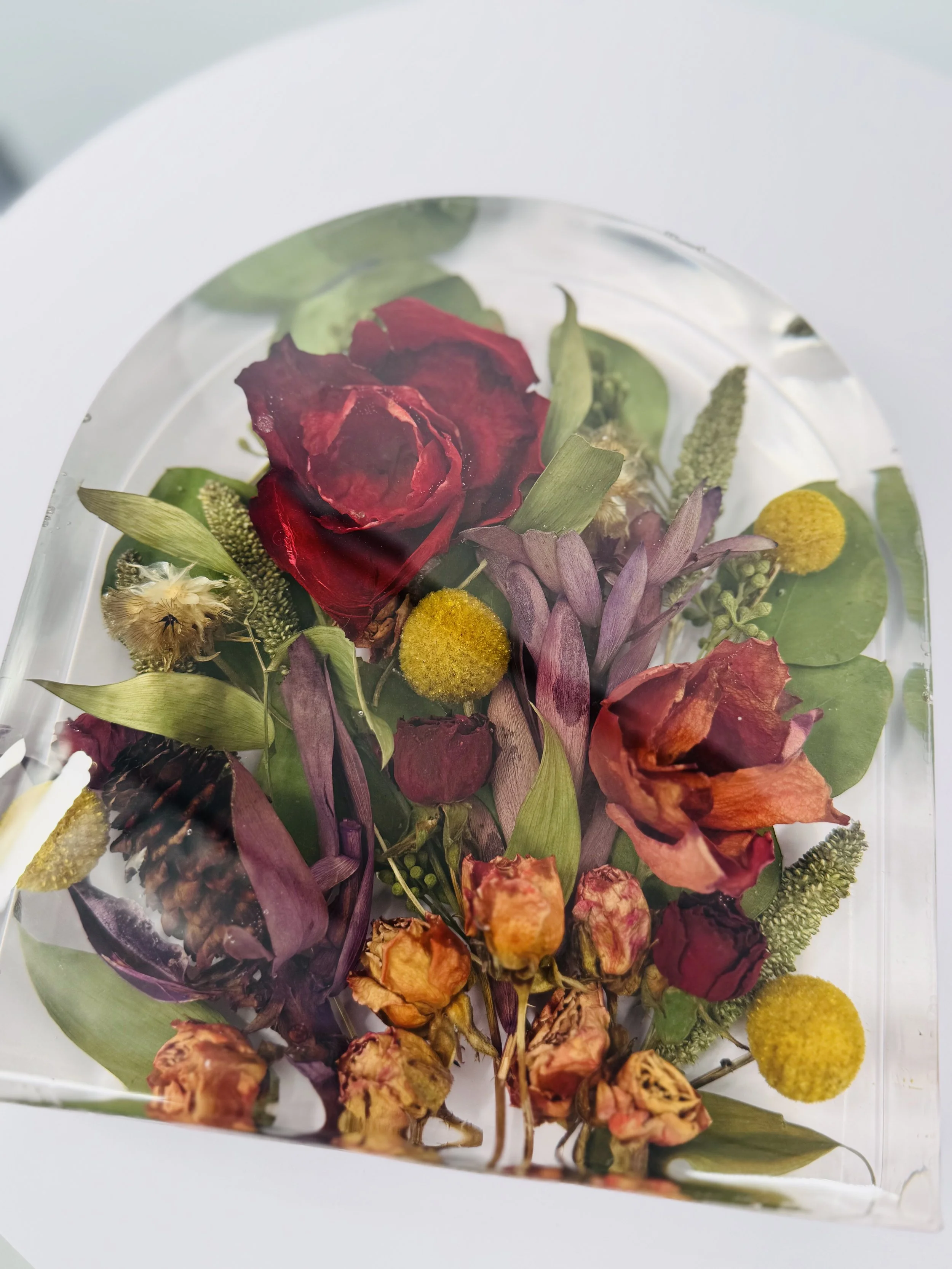 Wedding bouquet preserved in custom floral resin arch – Omaha floral preservation artist