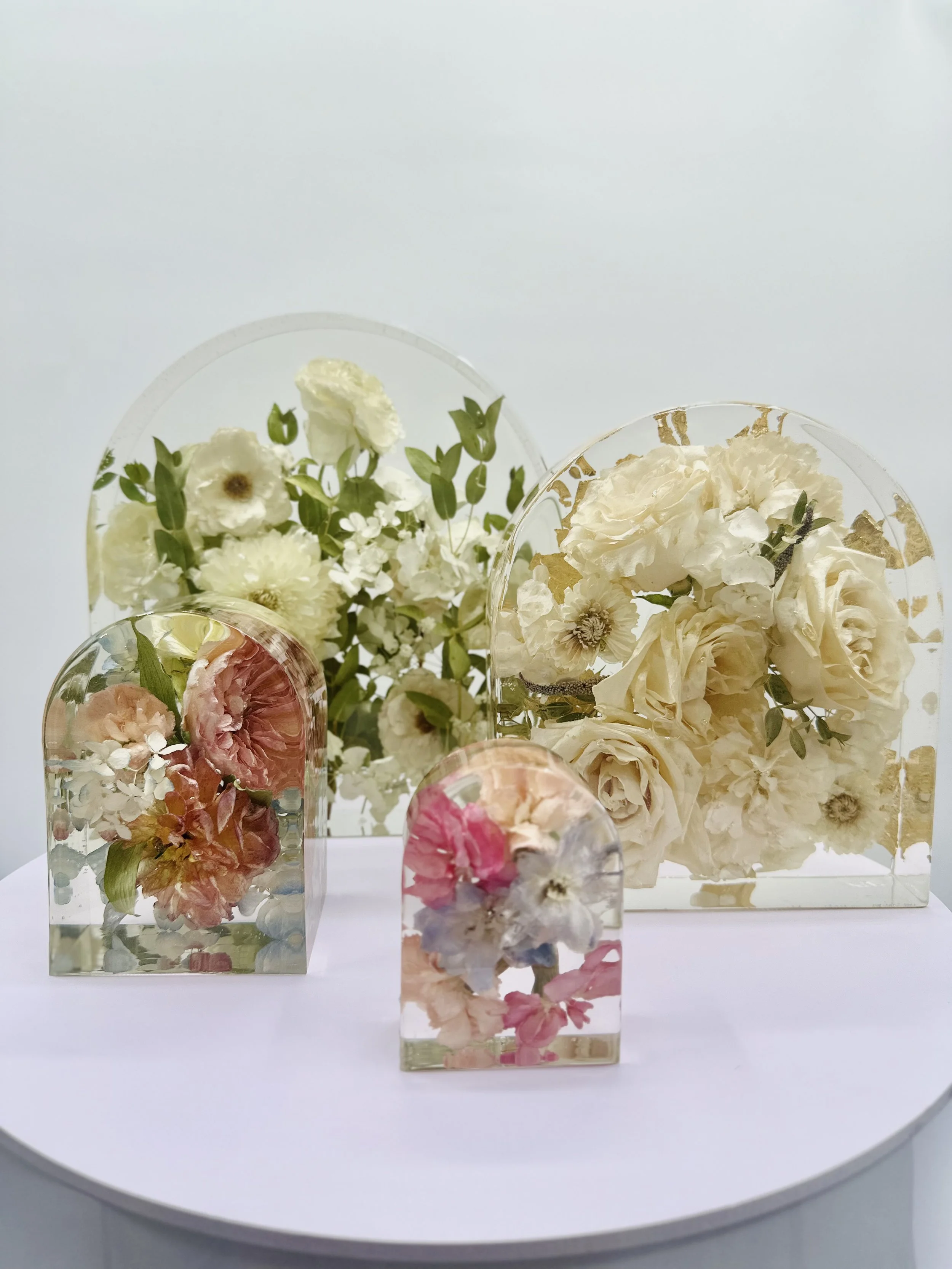 Wedding bouquet preserved in custom floral resin arch – Omaha floral preservation artist