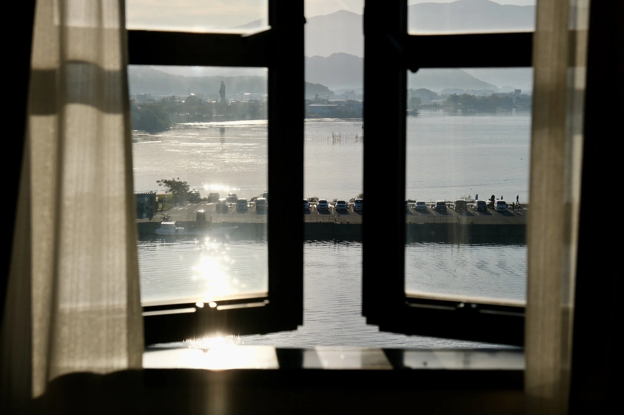 Japan — Inner Japan × Sensory Travel: sea view through a window