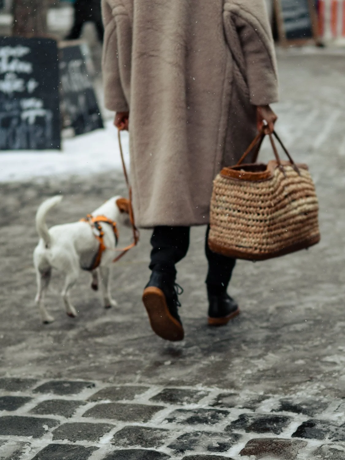 Local shopping at Viktualienmarkt on a snowy winter day, Munich