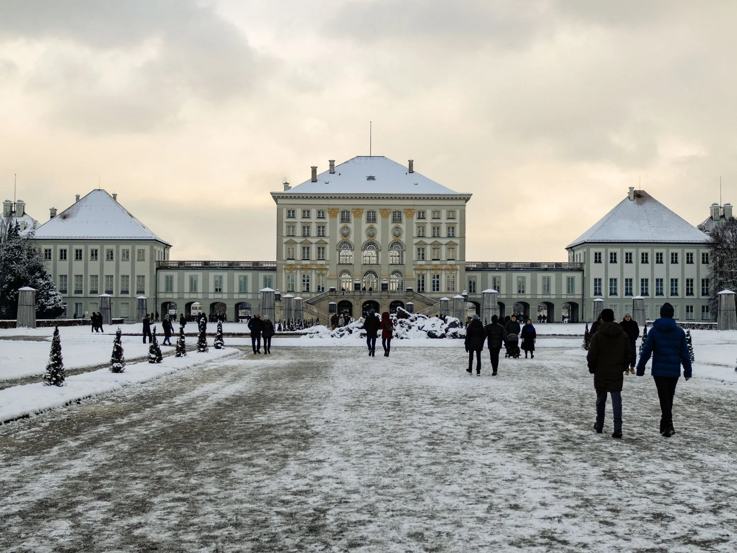Winter view of Nymphenburg Palace and gardens covered in snow, Munich, Germany