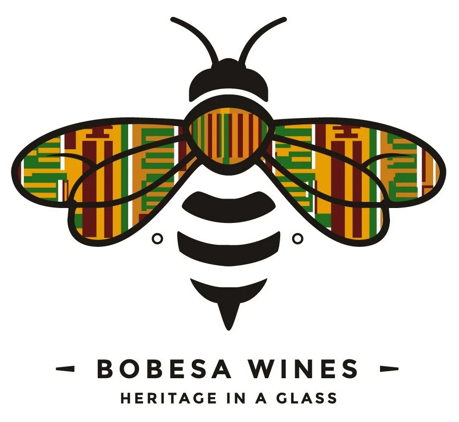 Logo of a bee with wings and body decorated with a colorful, striped pattern in green, yellow, red, and brown. Text beneath the bee reads 'Bobesa Wines Heritage in a Glass'.