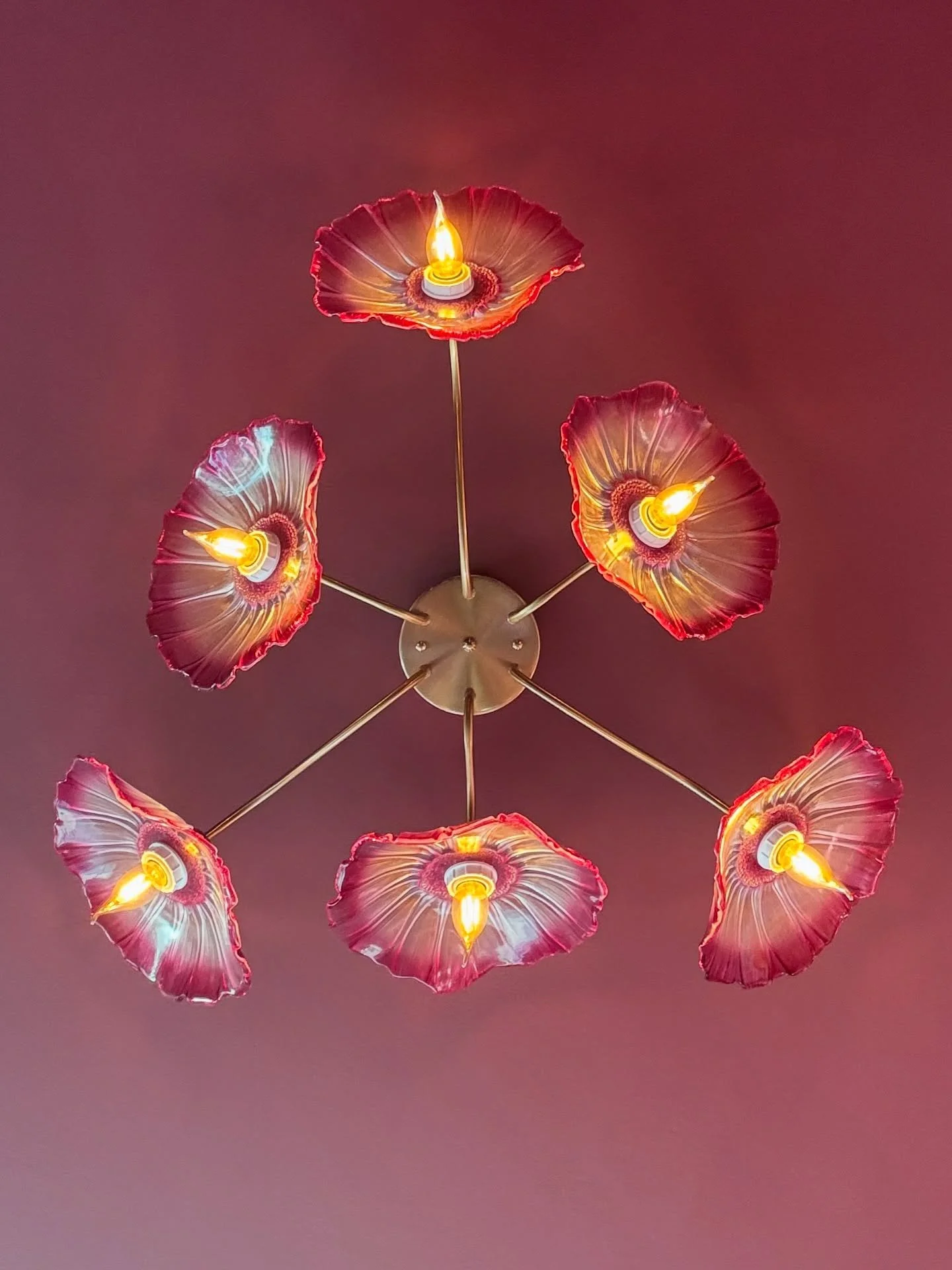 This floral 🌸 chandelier at @duefiori.lbc turns the ceiling into a garden of warm, glowing petals &mdash; proof that lighting can be both functional and fantastical.

#FlowerChandelier #HomeDecor #LightingDesign #BoldInteriors #StatementPiece