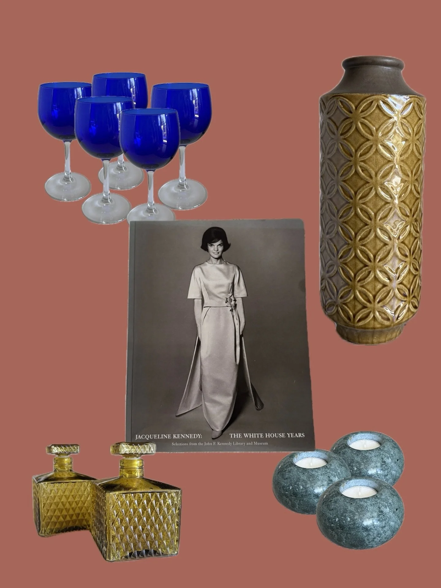Vintage elegance is here 💙🍷 Featuring cobalt glassware, mid-century amber decanters, textured ceramics, and a timeless Jackie O. collectible. It&rsquo;s all about mixing sophistication with character.