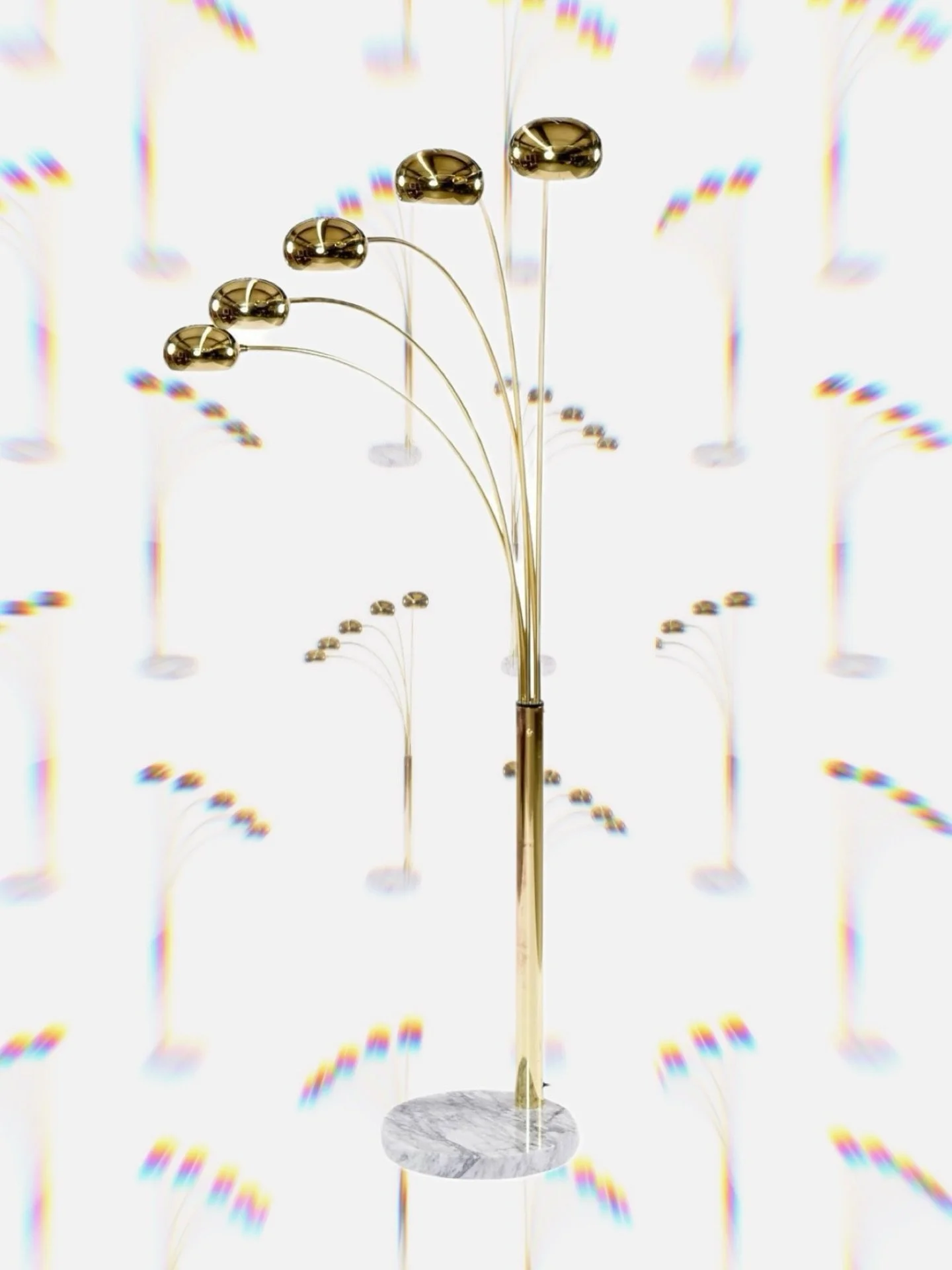 ✨Guzzini‑style arc lamp✨ with sweeping brass arms rising from a solid marble base. 

Available online and In shop at @urbanamericana 

#guzzini #lighting #shopvintage #interiordesign #collectedhome