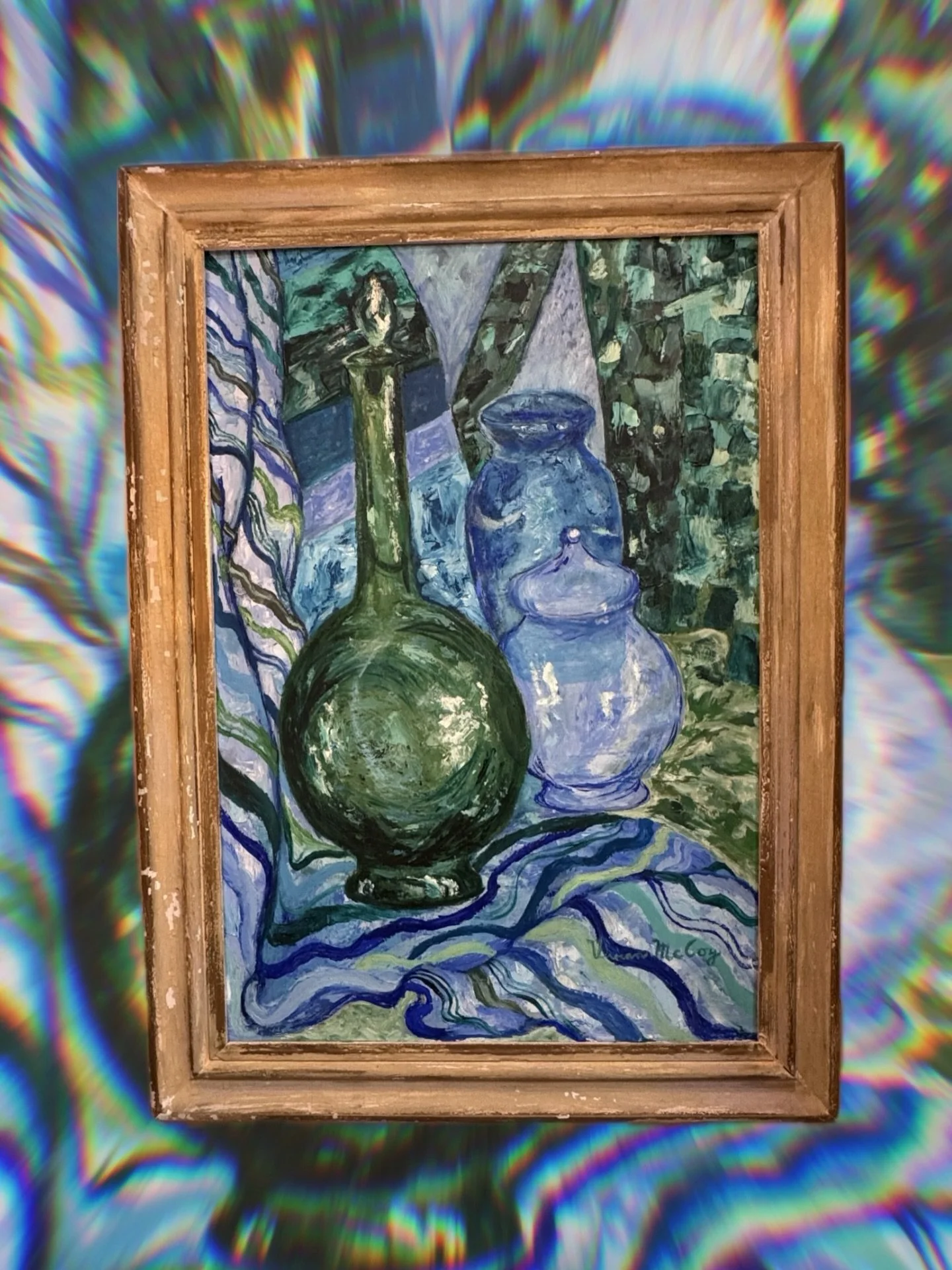 This 1964 &ldquo;Blue Indigo&rdquo; still life by Vivian McCoy captures a beautiful balance of movement and calm, with rich brushwork and layered tones that feel both bold and serene. A true mid-century gem with lasting presence.

Available online an