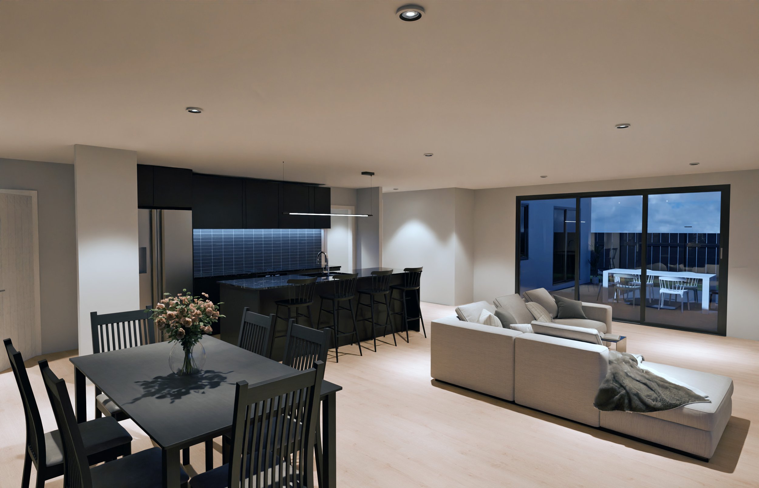 Modern open-concept living room and kitchen with dining table, sofa, bar seating, and sliding glass door leading to an outdoor patio.