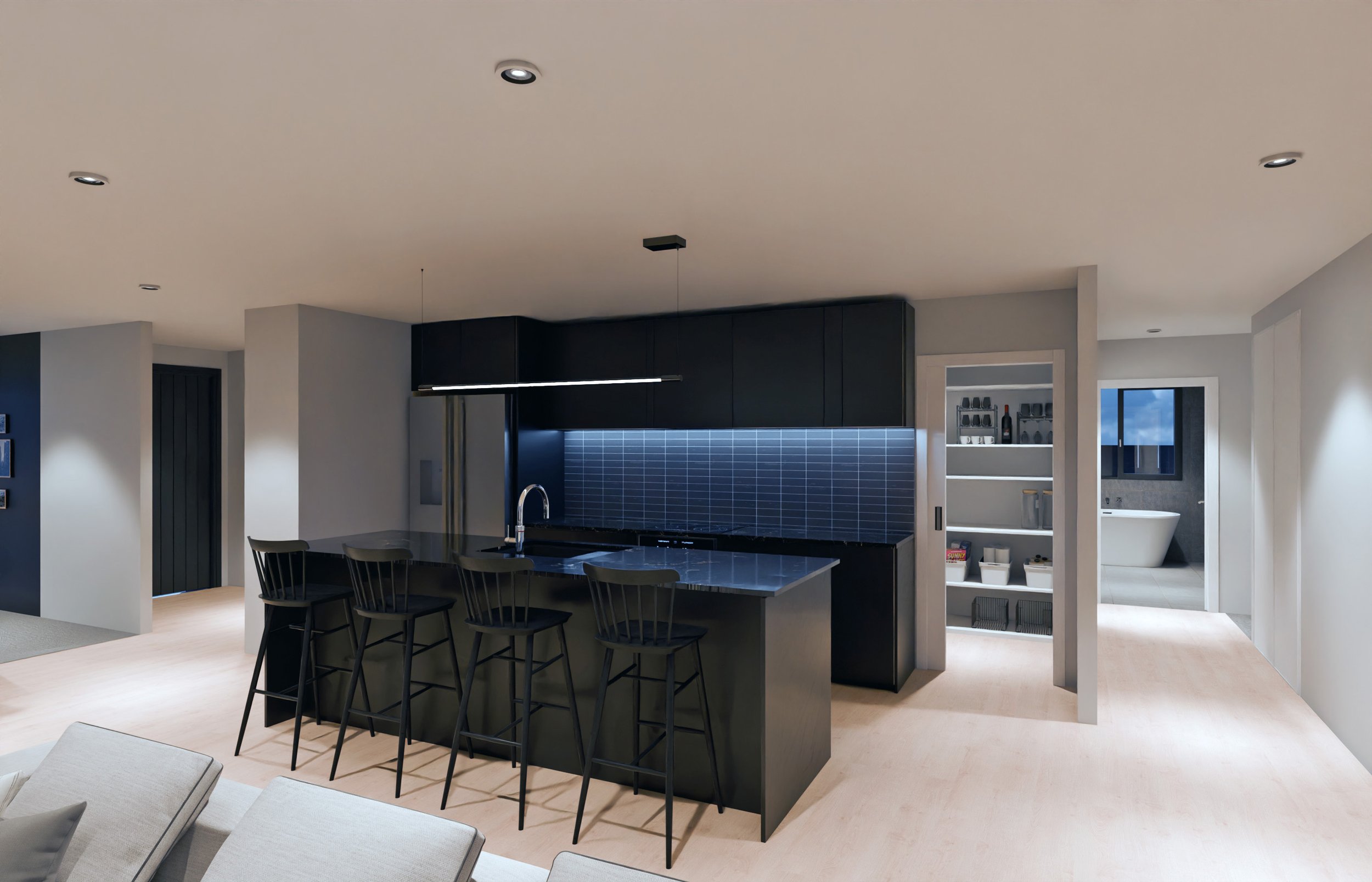 Modern kitchen with black cabinetry, a black island with barstools, and a light wooden floor. There's a glimpse of a bathroom with a bathtub in the background.