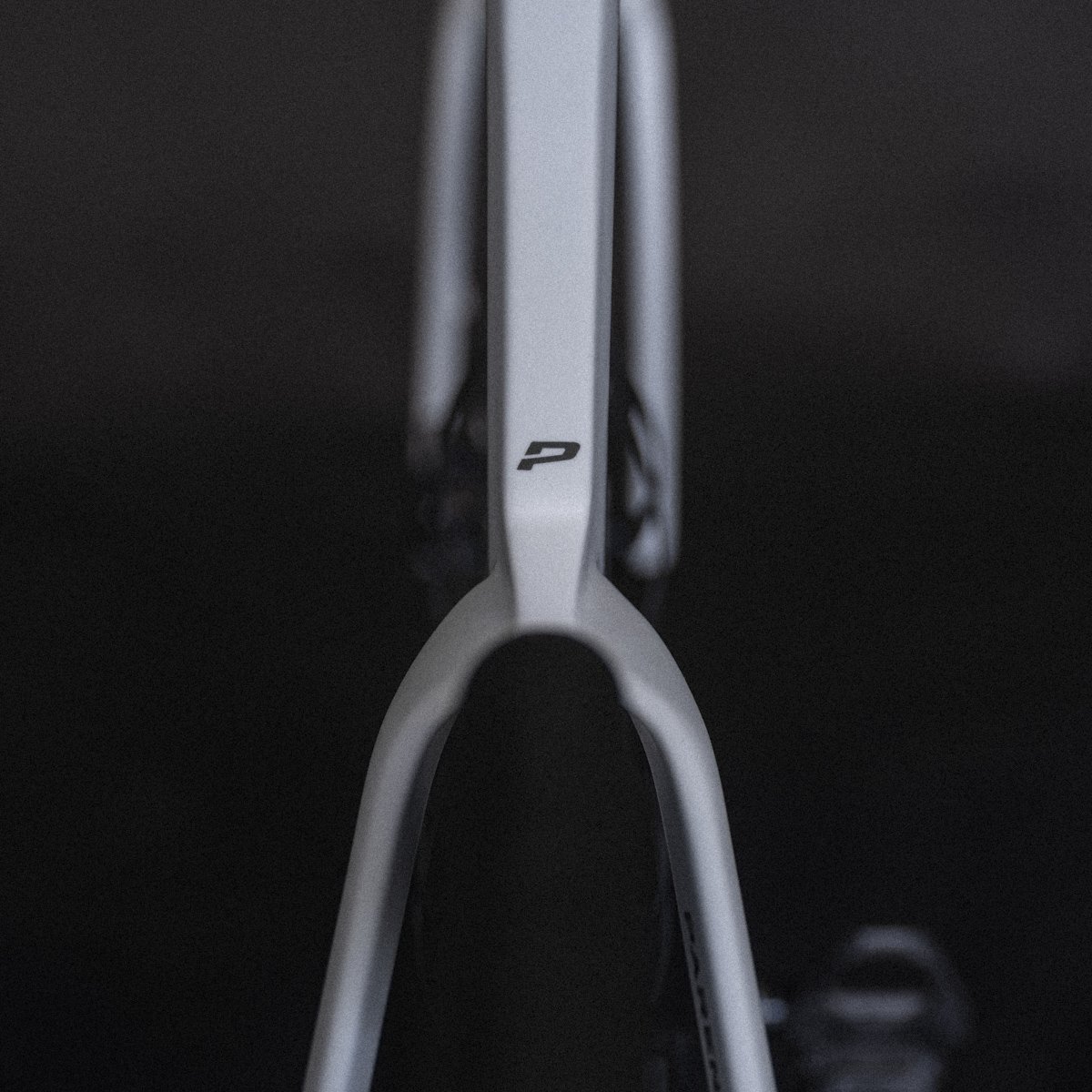 PARENTESI frame close-up with a small logo on the center of the frame.