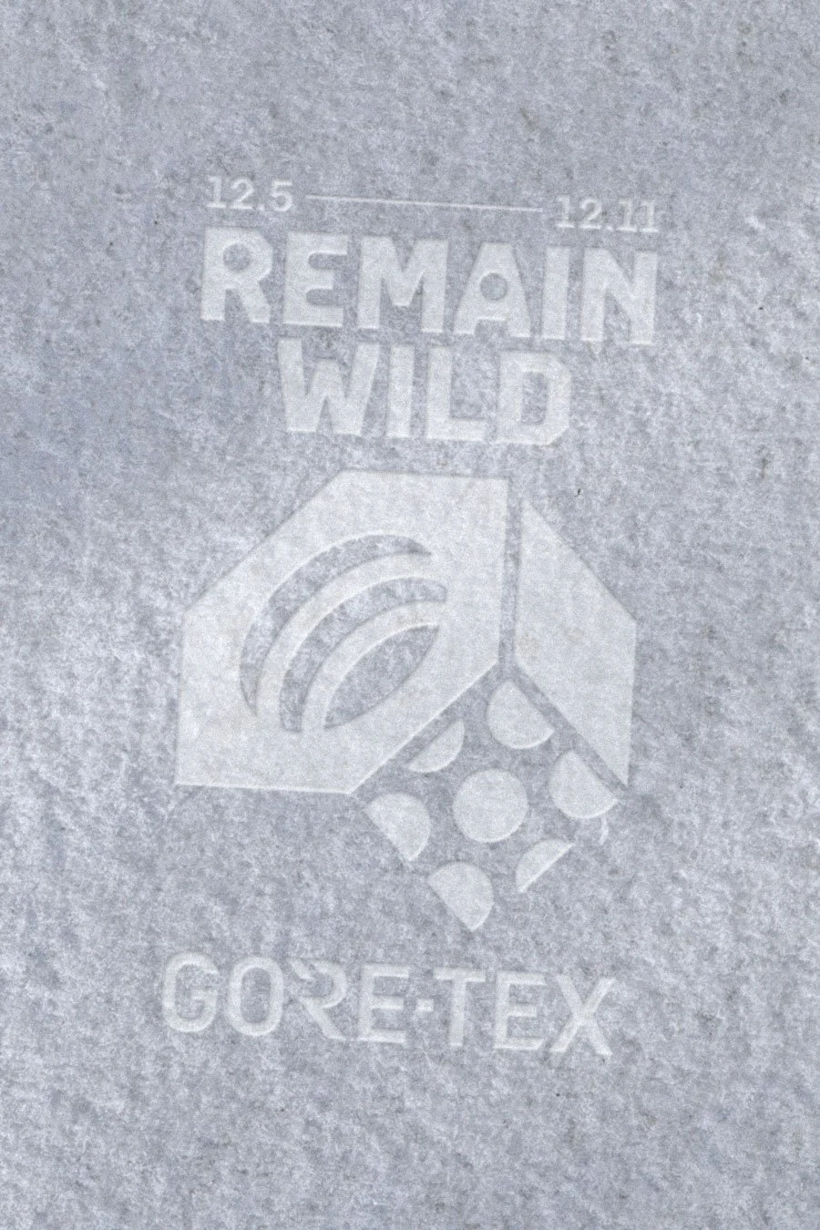 mountain hardwear logo printed into snow