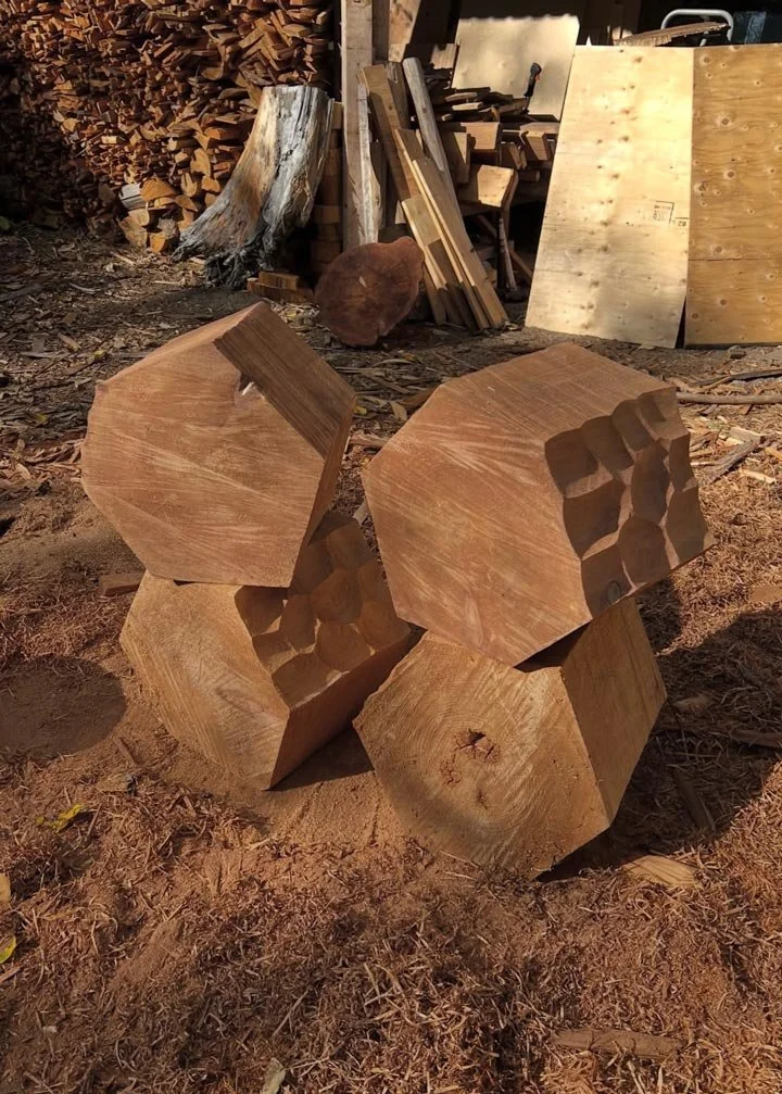 wooden sculpture process shown at timber yard