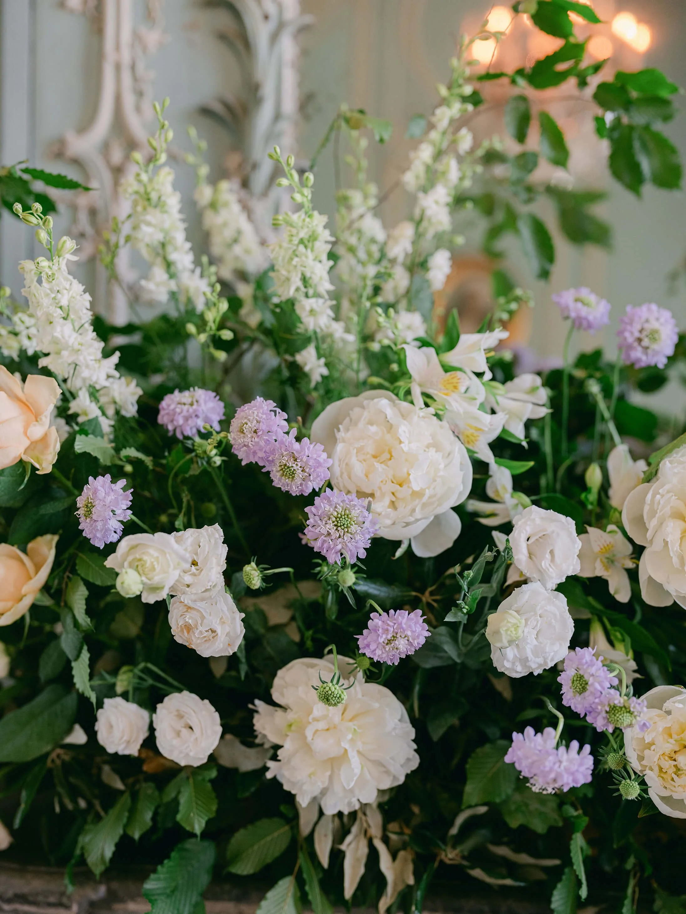 Floral team working backstage before the Château de Champlâtreux ceremony