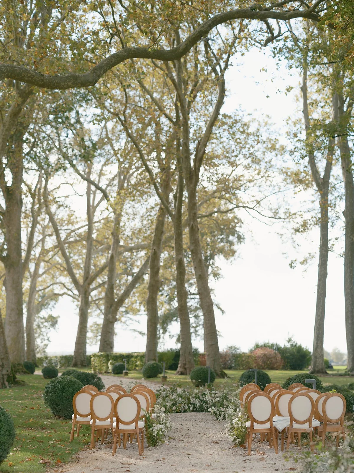outdoor-aisle-flower-arrangement-chateau.jpg