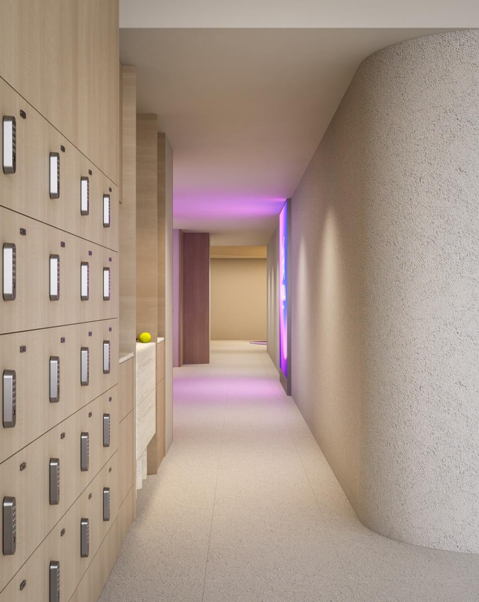Modern hallway with wooden lockers on the left, textured beige wall on the right, and purple lighting accents at the end of the corridor.