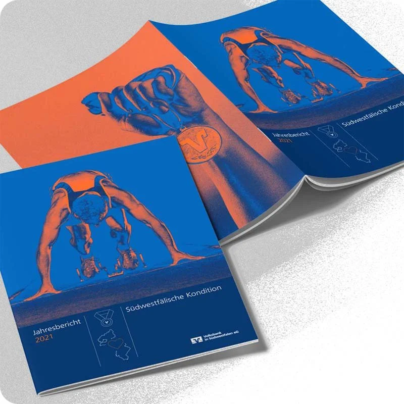 A4 Magazin Cover. Jahresbericht der Volksbank. Zu sehen ein Sprinter in Startposition.