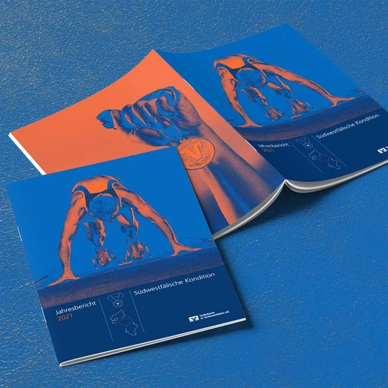A4 Magazin Cover. Jahresbericht der Volksbank. Zu sehen ein Sprinter in Startposition.