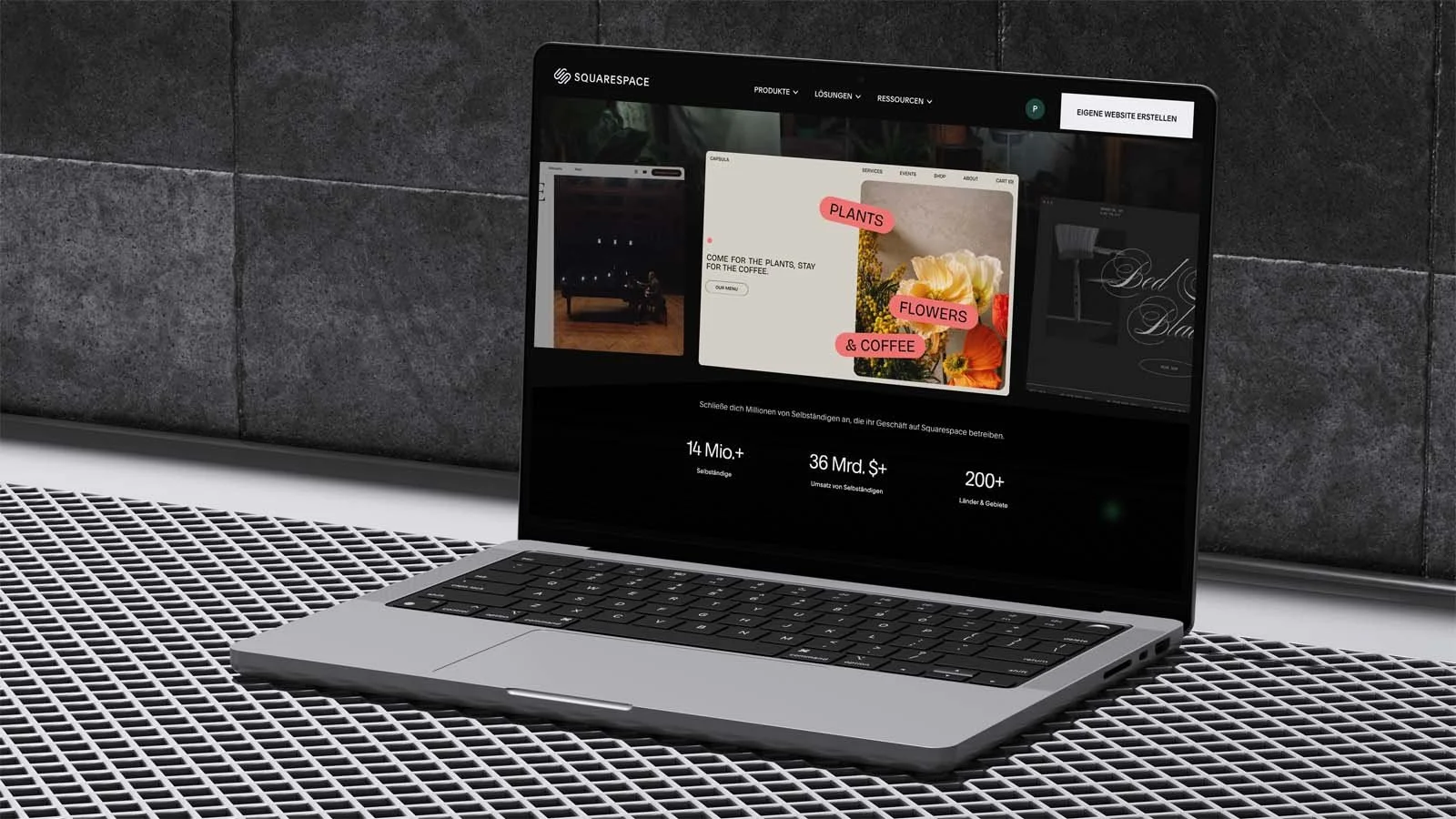 Bild eines Macbooks mit der Startseite von Squarespace auf dem Display