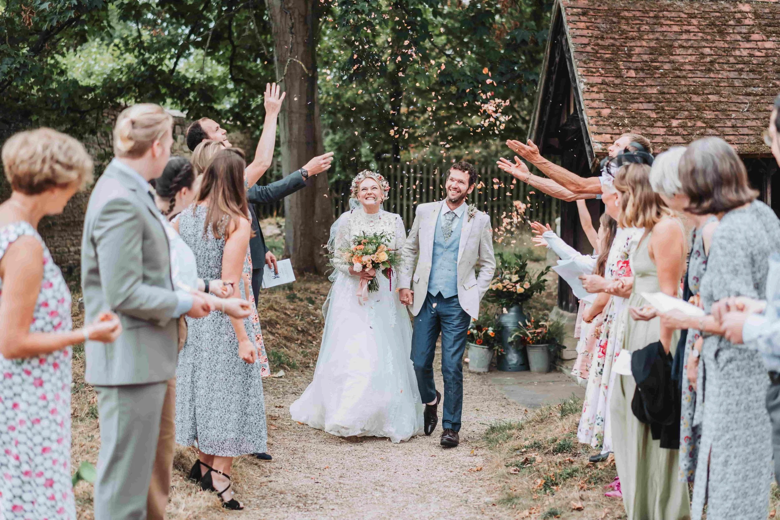 Natural candid wedding moment of bride and groom in Oxford captured by documentary wedding photographer