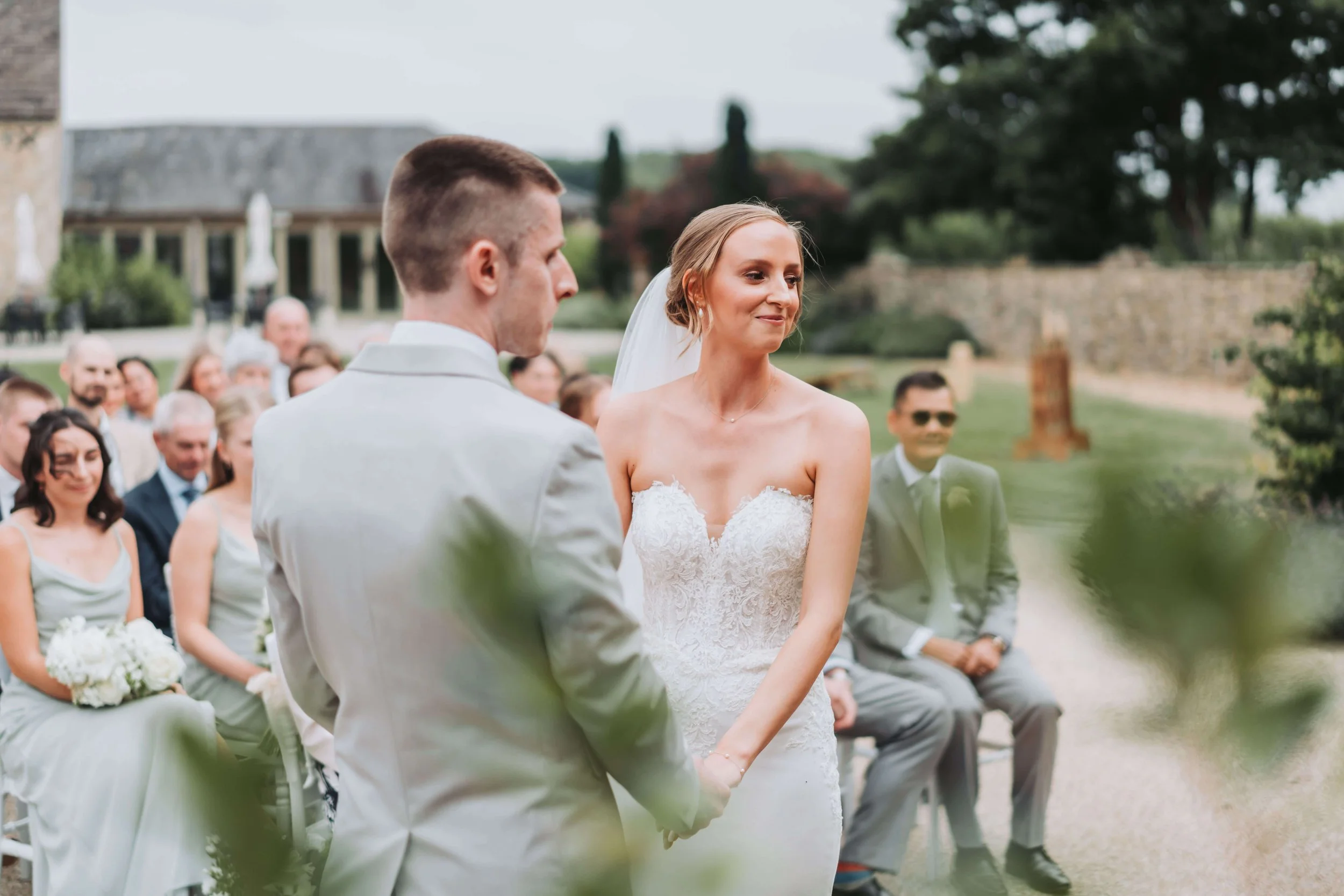Caswell House wedding venue in Oxfordshire with Cotswold stone barns