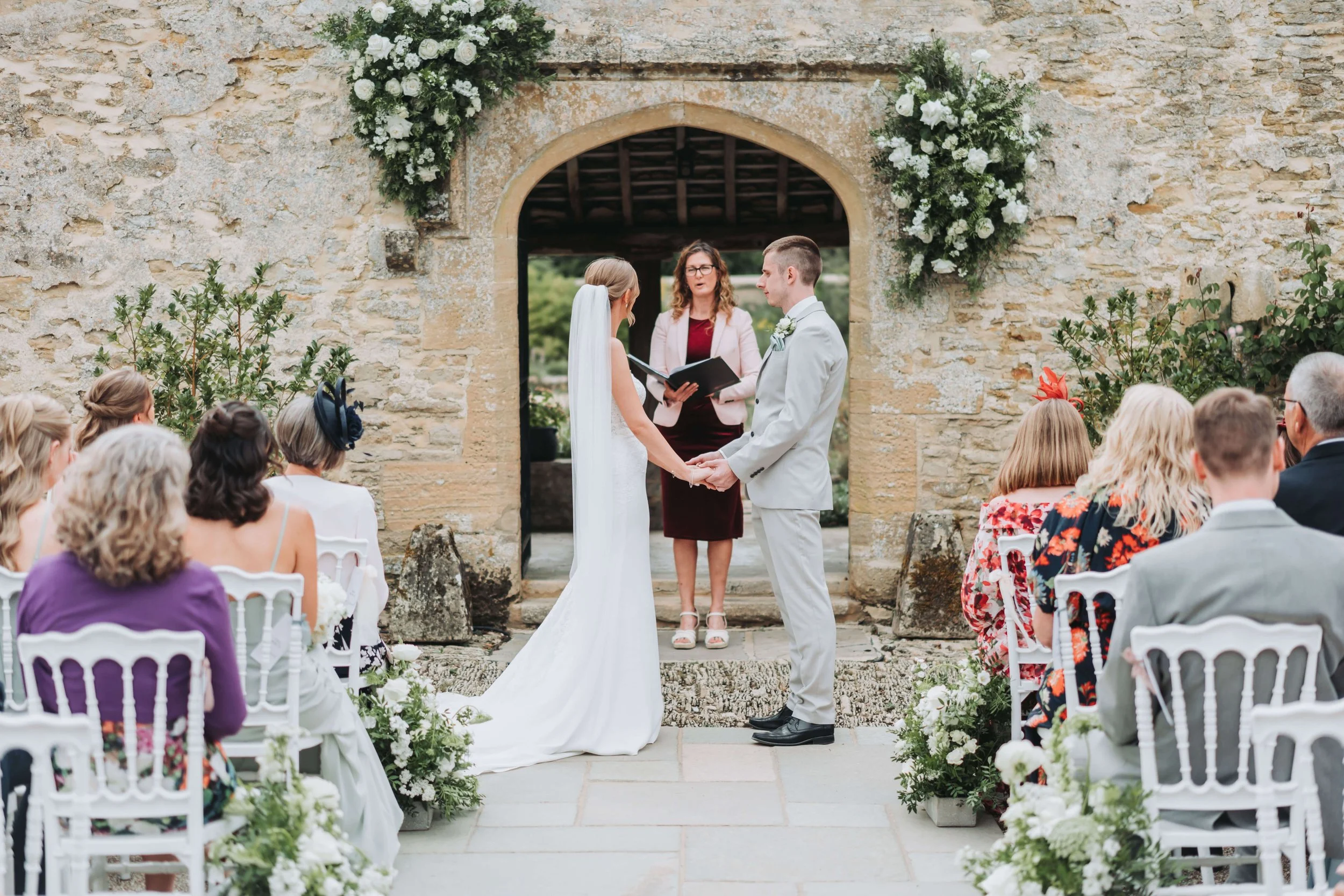 Wedding ceremony at Caswell House barn venue in Oxfordshire