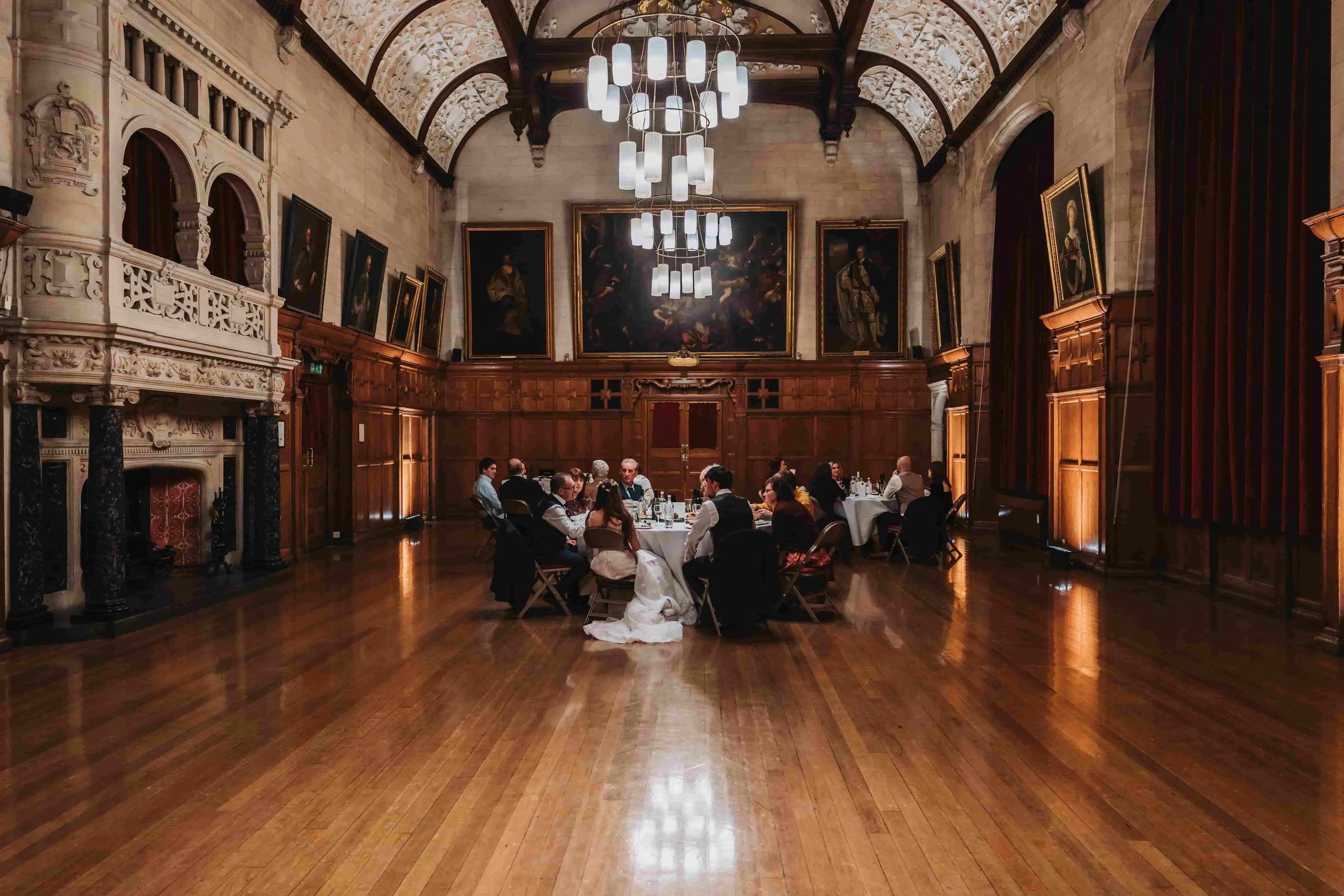 Wedding reception atmosphere inside the Assembly Room at Oxford Town Hall