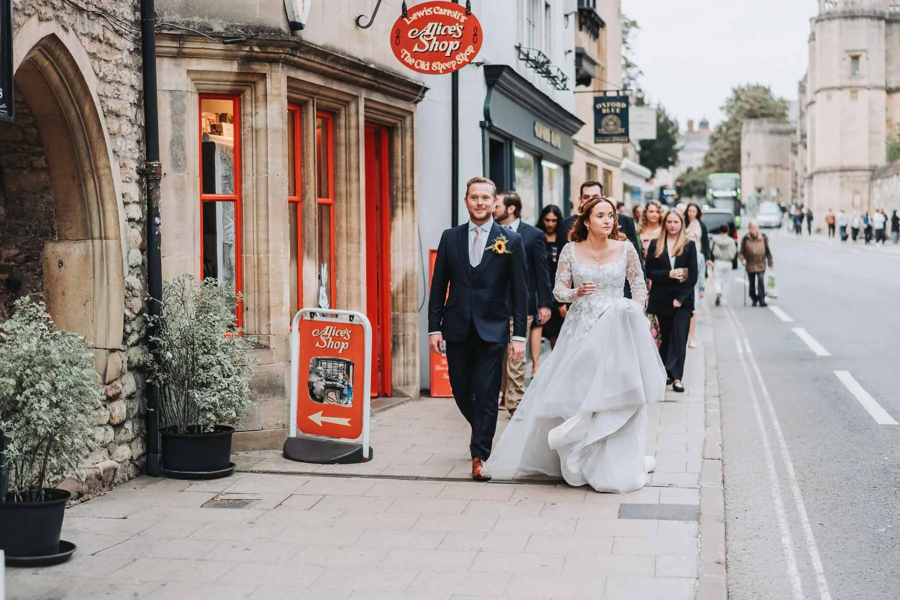 Weddding-guests-walking-through-oxford-city.jpg