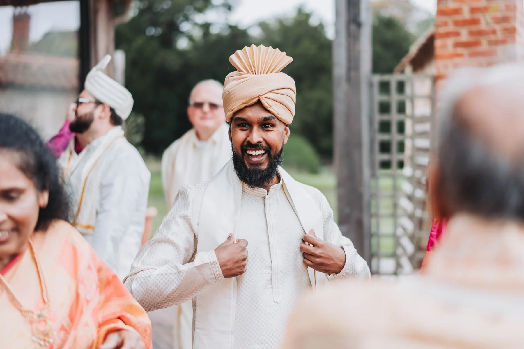 groom-smiling-before-oxfordshire-wedding.jpg