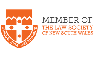 Logo of The Law Society of New South Wales featuring a shield with orange and black design elements and the organization's name and motto.