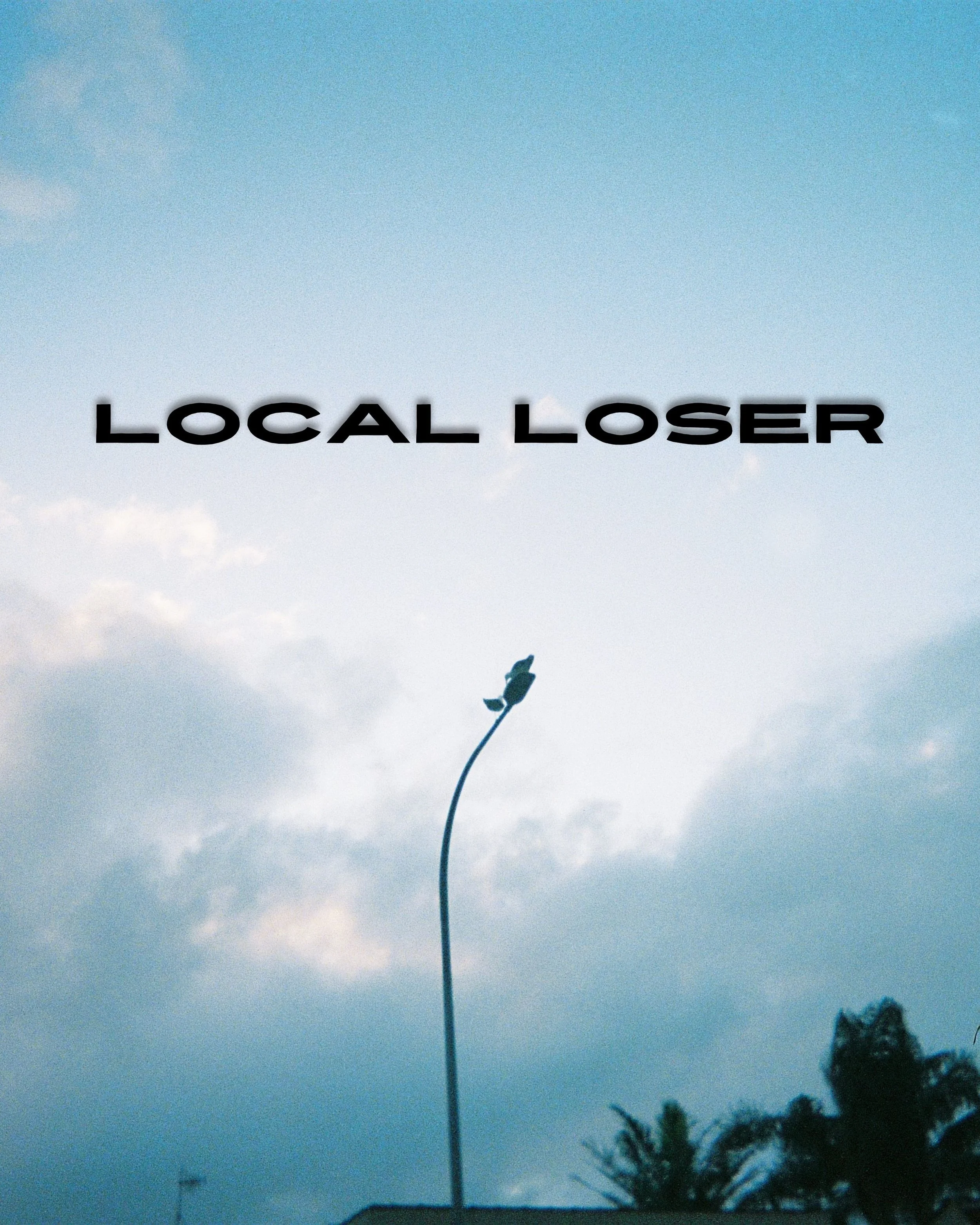 Text on a cloudy sky background that says 'Local Loser' with a bent streetlamp and trees in the foreground.