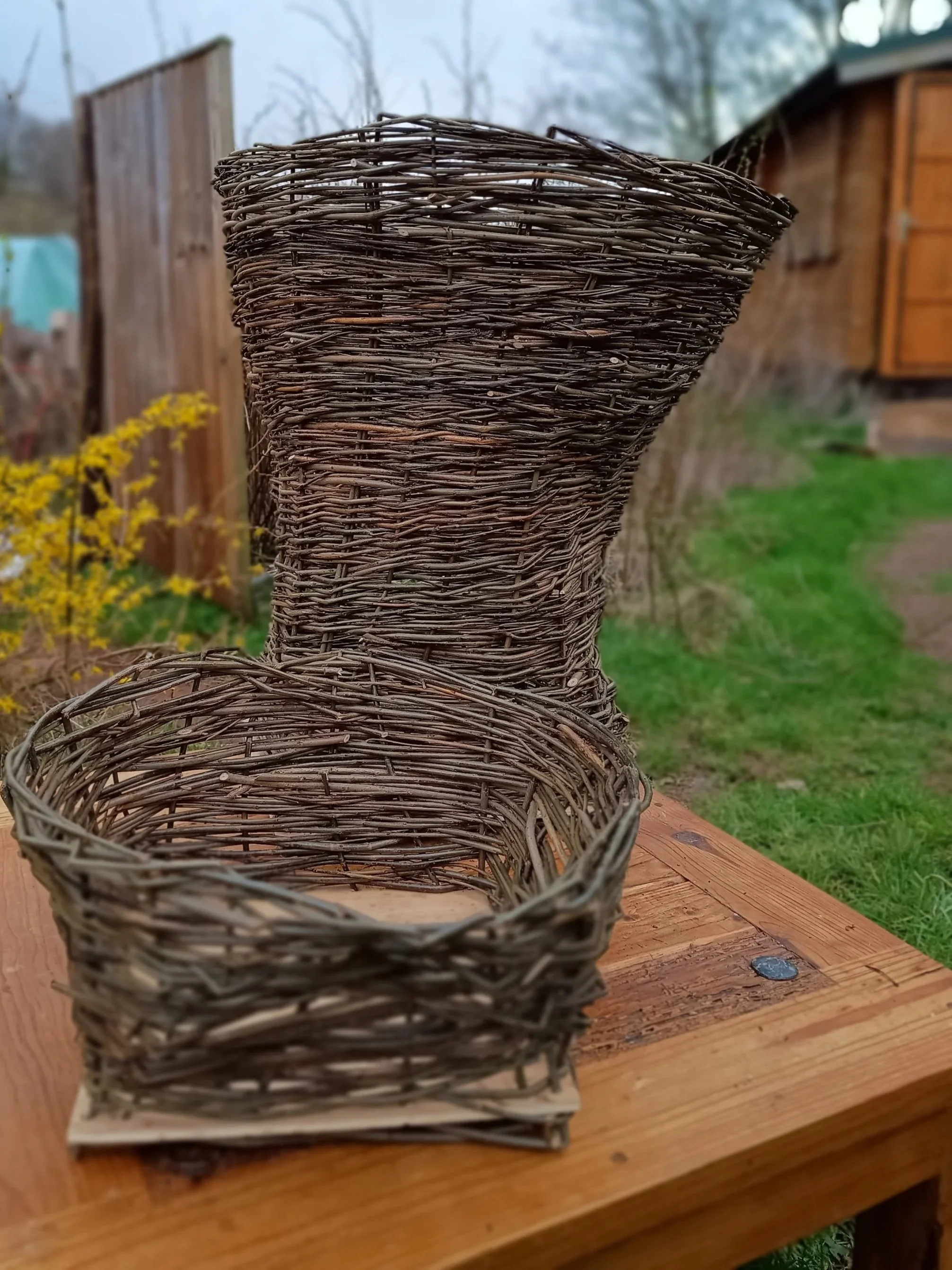 Item 11 Extra large static log basket with a wooden base £65 and Item 12 accompanying kindling basket also with a wooden base £20 (£10 off if you purchase both items)