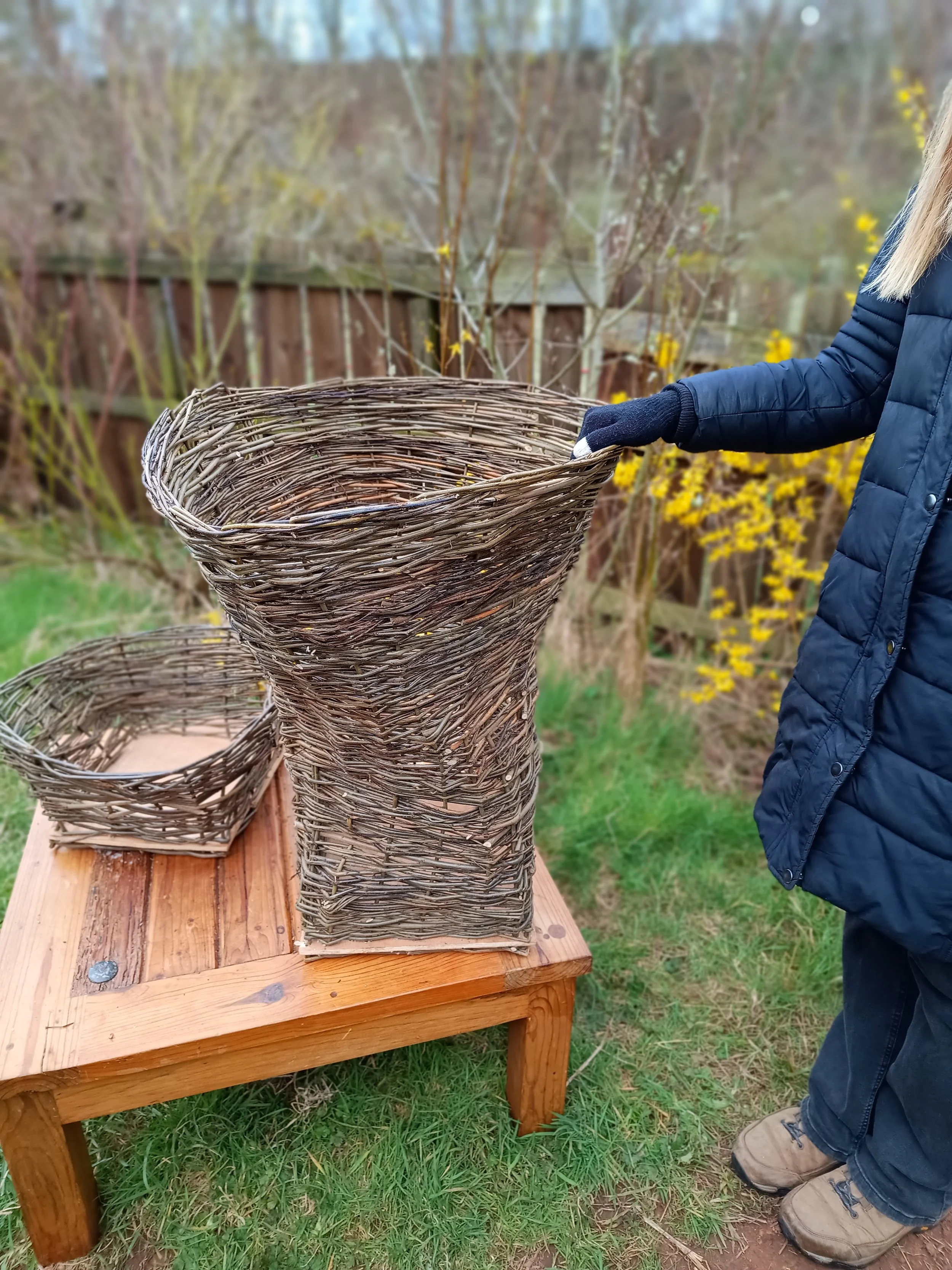 Item 11 Extra large static log basket with a wooden base £65 and Item 12 accompanying kindling basket also with a wooden base £20 (£10 off if you purchase both items)