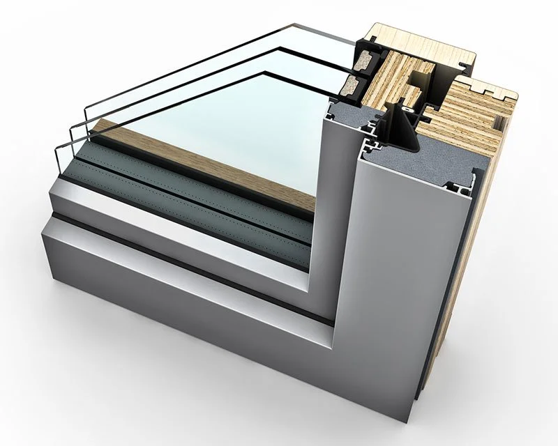 Cross-section of a modern window frame showing glass panes, wooden framing, insulation layers, and metal components.