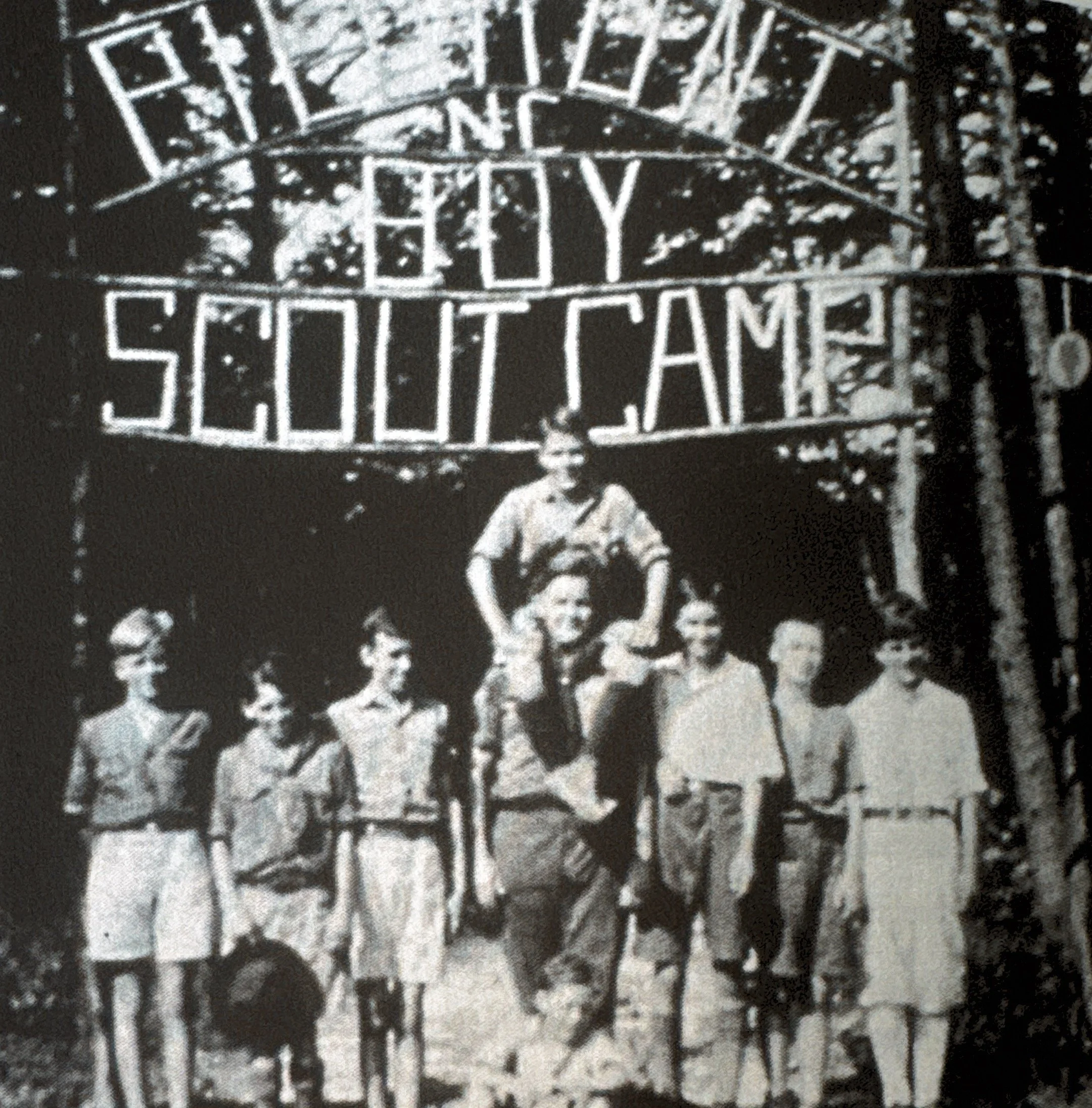 Scouts under the original entrance gate, 1930s