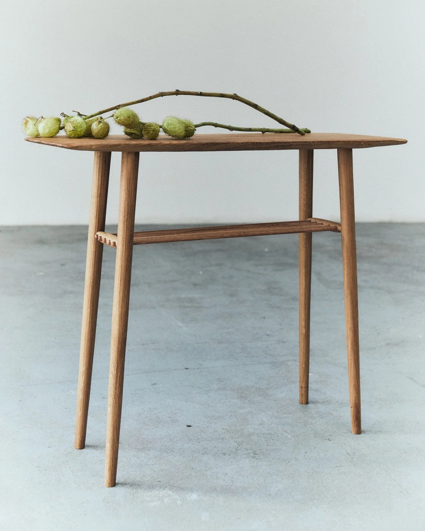 A narrow console that settles into everyday life without asking for attention. Somewhere for keys at the end of the day, a spot for a plant you actually remember to water, or just a simple line that helps a hallway feel finished. 

Solid oak througho