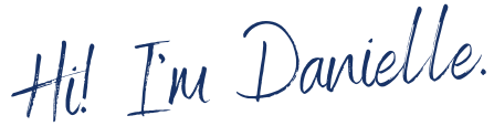 Text that reads 'Hi! I'm Danielle' in blue cursive font on a transparent background.