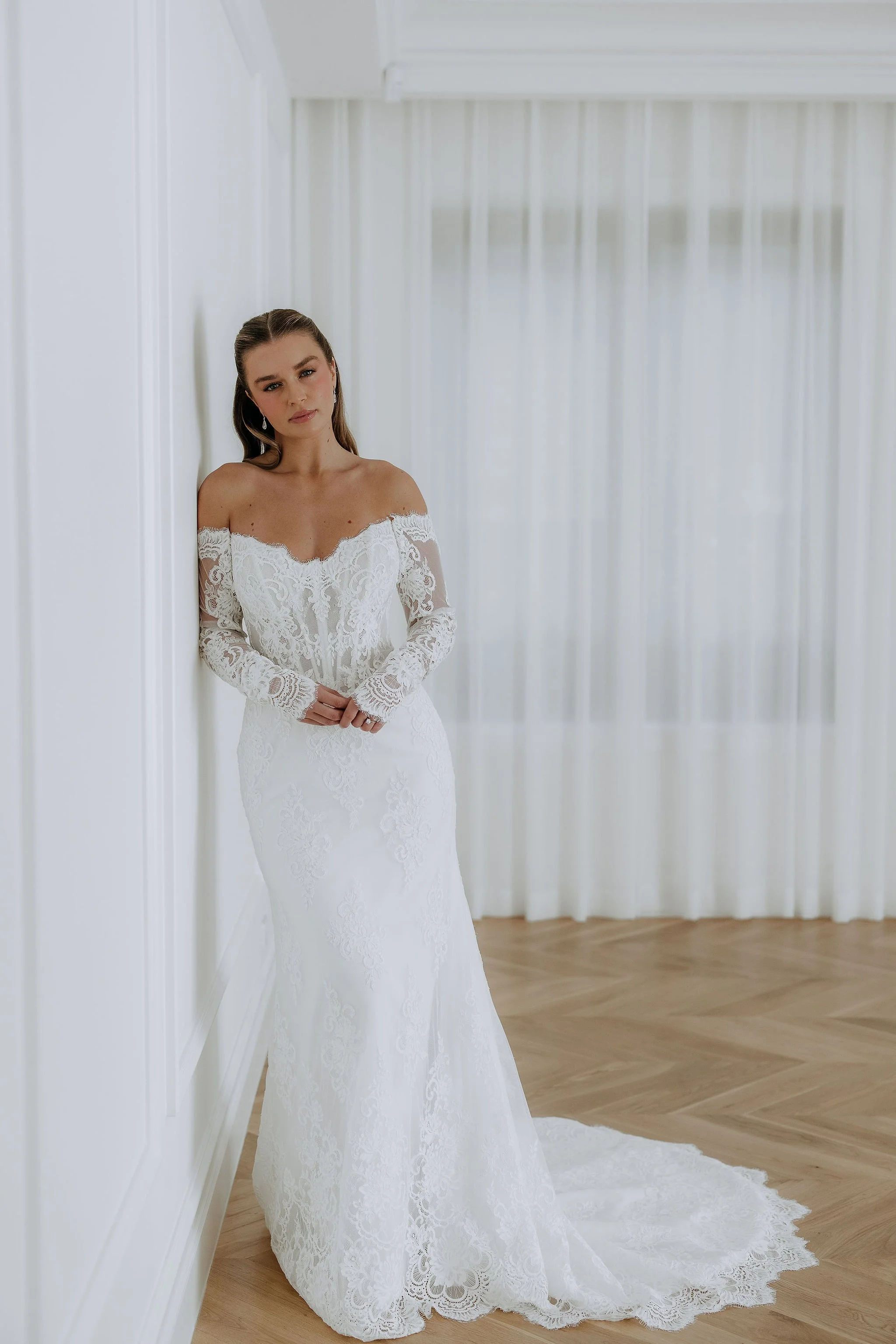 Off the shoulder lace dress by Kelly Lin. Mimi is Made from modern lace. Available to try at our Salisbury Boutique.