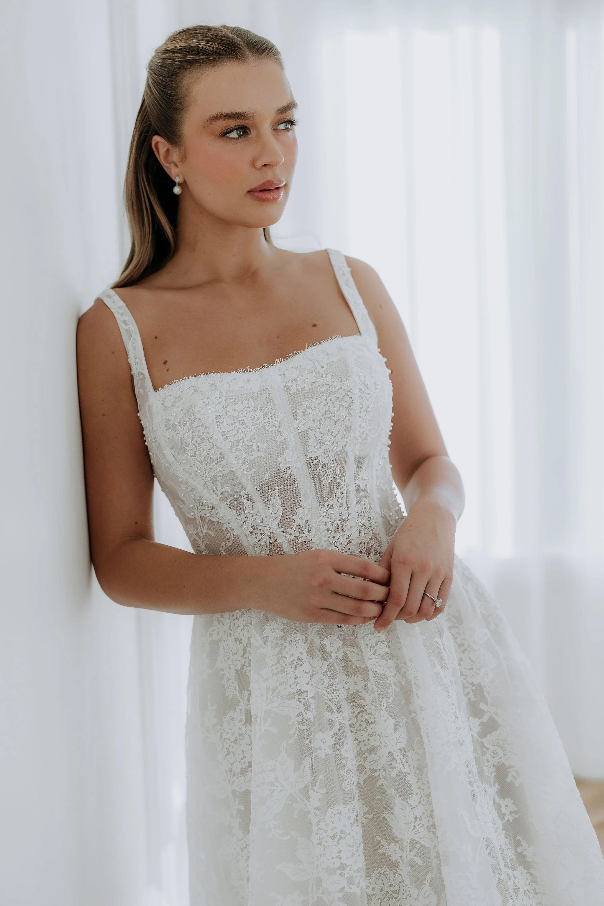 Beautiful Elle by Kelly Lin, perfect for curve bride and available to try at our Salisbury wedding dress shop.