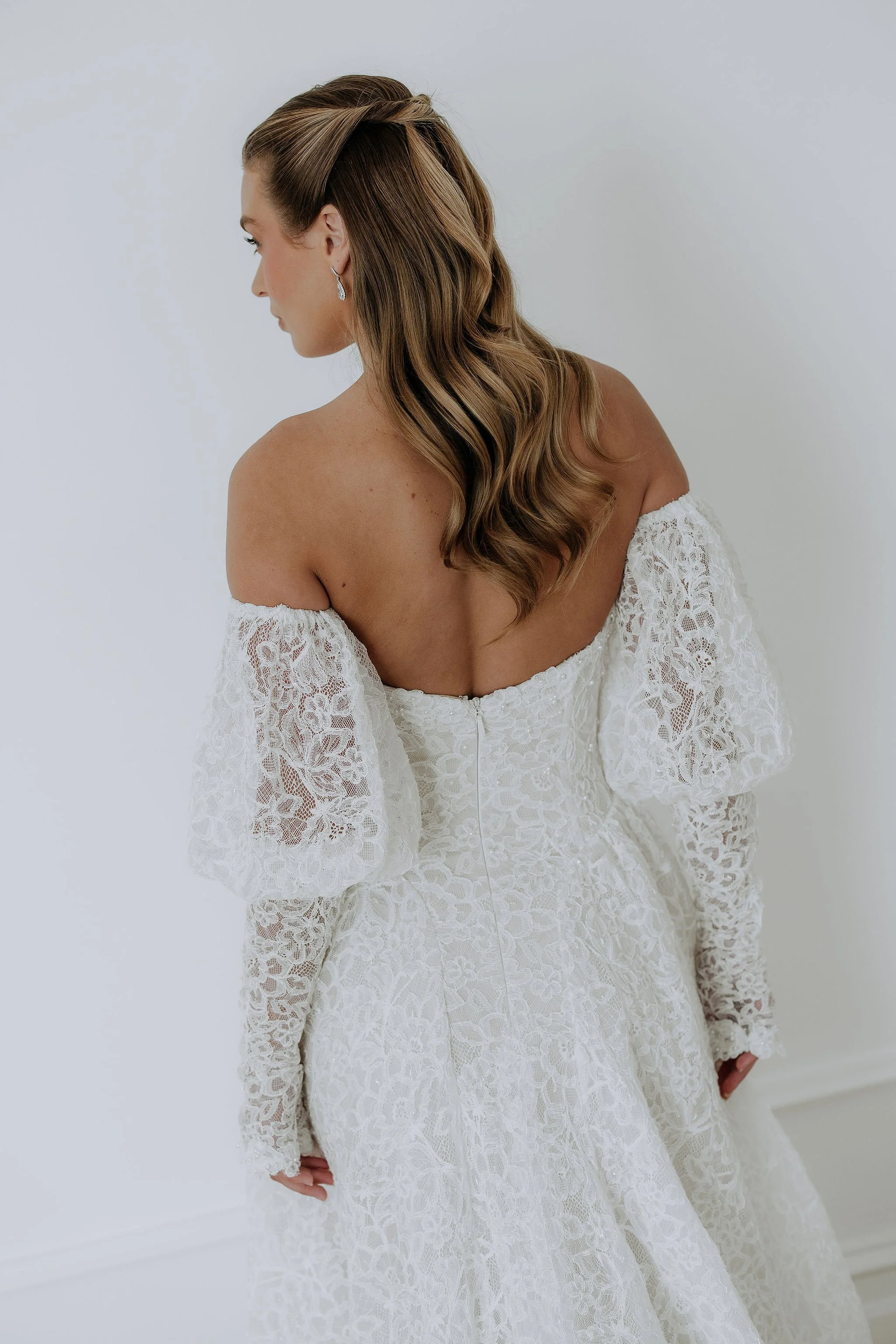 Elegant lace wedding dress by Kelly Lin. Lottie is for the bride wanting modern vintage style.
