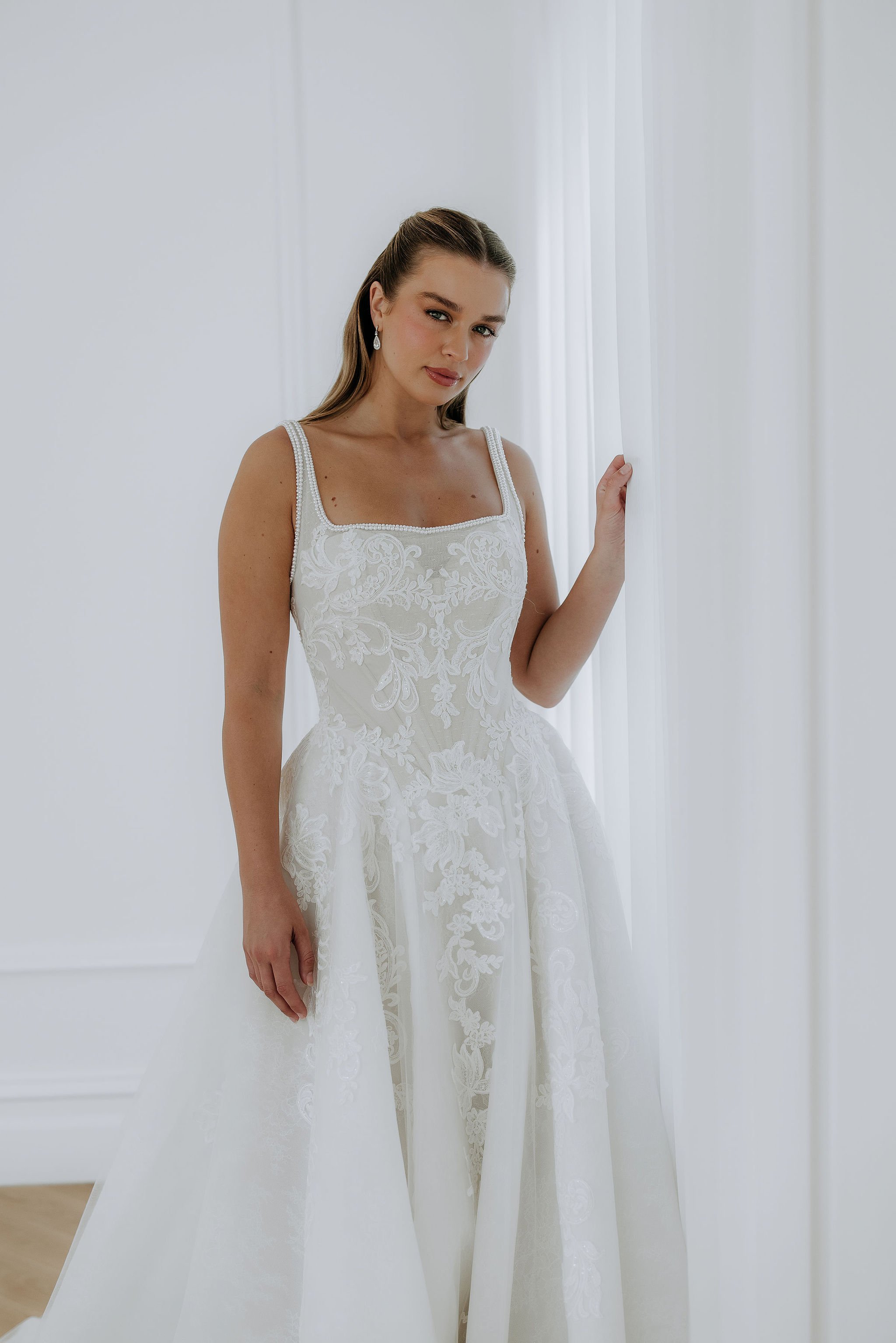Elegant Ornella by Kelly Lin is perfect for the Modern bride with a vintage heart. Make a statement in this wedding dress.
