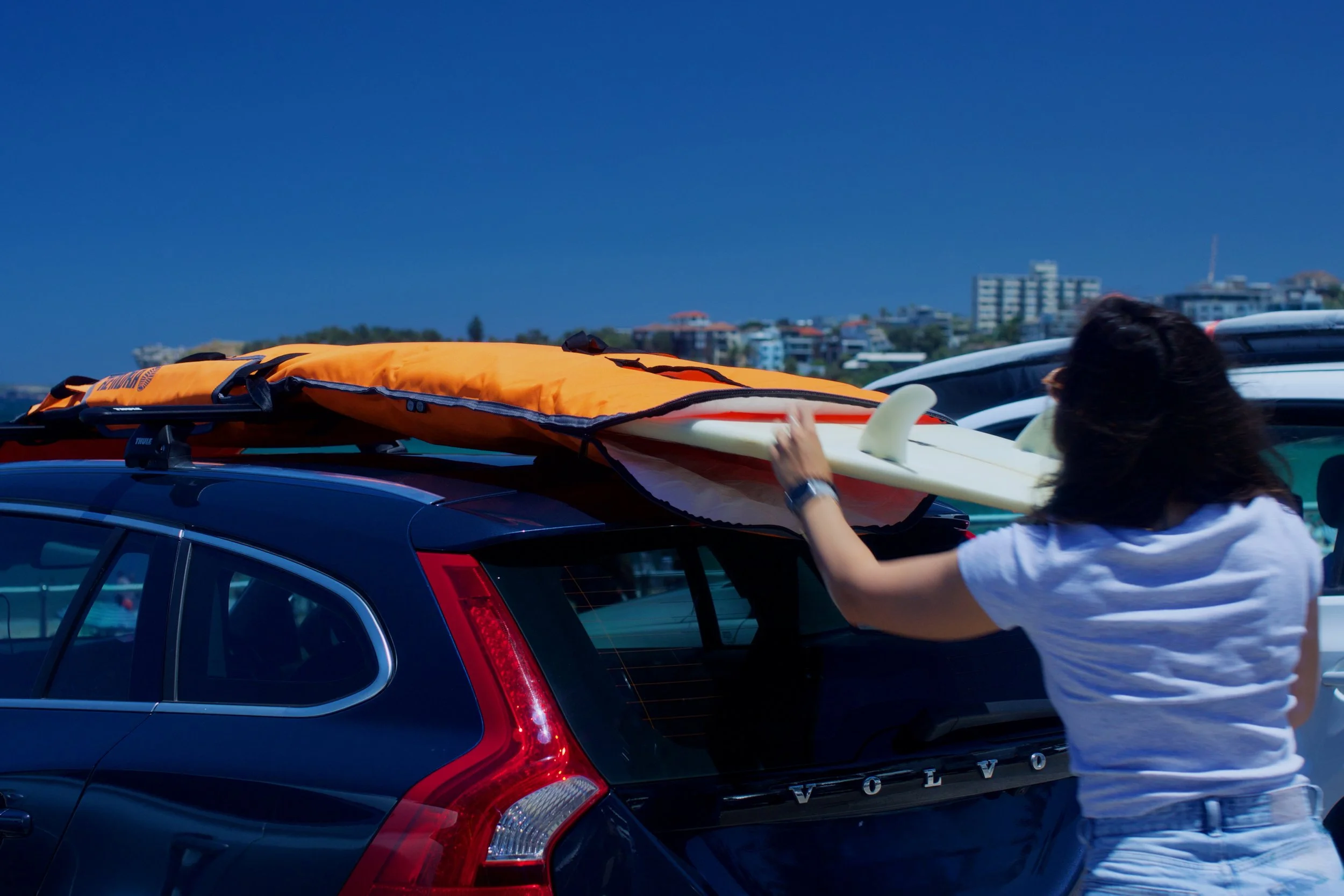 00-hero-image-Remora-surfboard-bag-stays-on-car-orange-0098 (2).jpeg