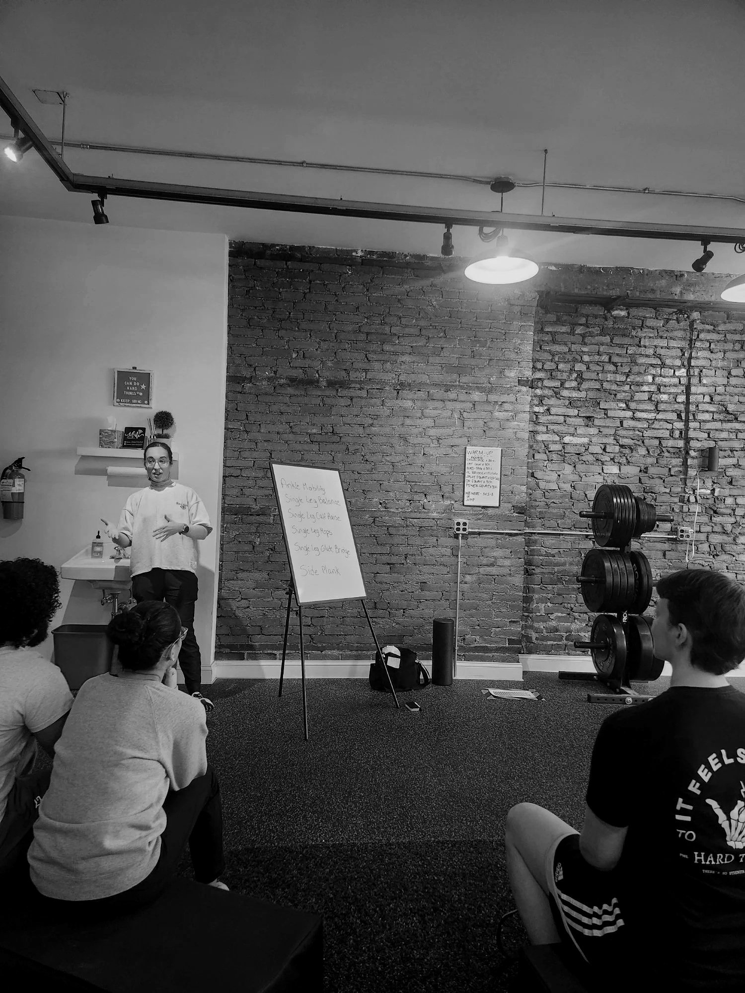 Katy Vieira, physical therapist and runner, offering a injury prevention workshop for novice and recreational runners in Manayunk, Philadelphia. 