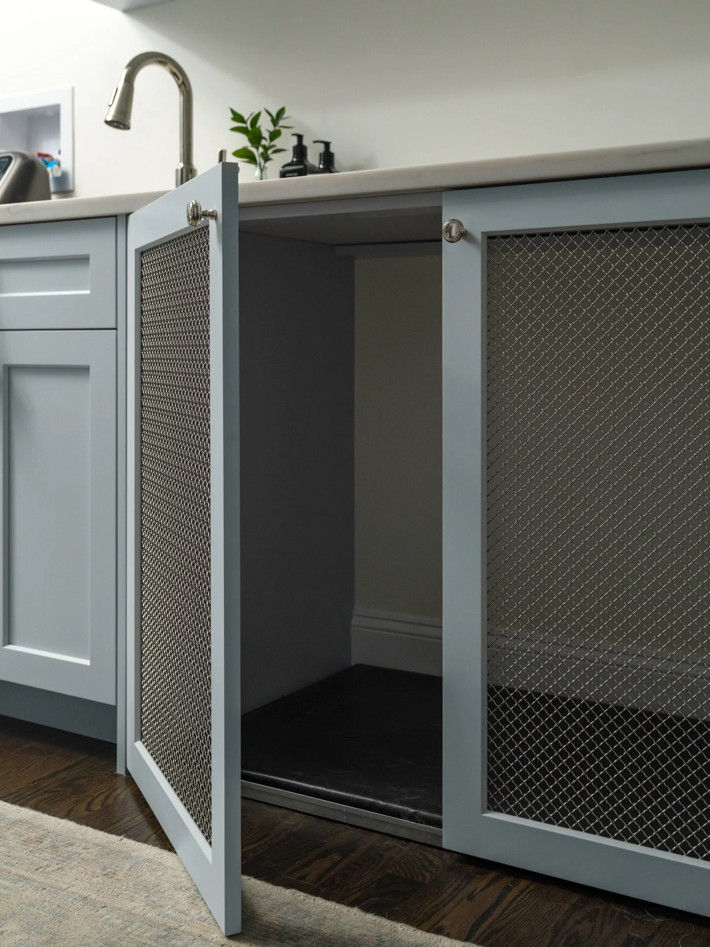 Design should work beautifully for every member of the home. This hidden crate shows how custom detailing and smart planning can turn a functional need into a natural extension of the room. A simple way to keep things organized while giving your pup 
