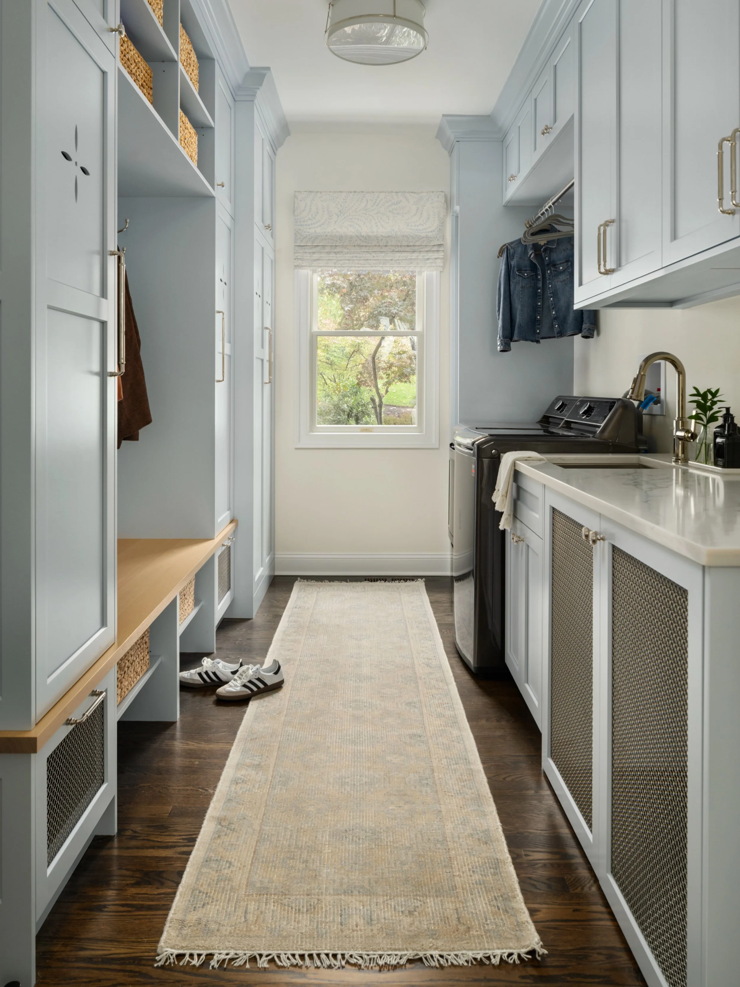 The best seat in the house for taking off muddy boots. 🥾 Entryways usually catch all the daily chaos, so we used massive cabinetry to completely hide away the daily gear and utility items. High-traffic rooms get tough use, but they don&rsquo;t have 